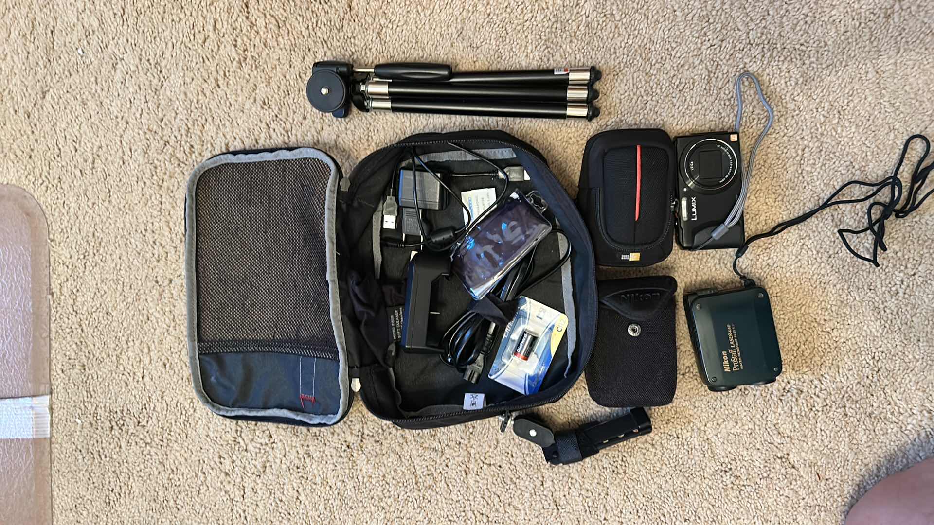 Photo 1 of Lumix camera, Nikon, Prostaff, laser carrying case, tripod, and accessories