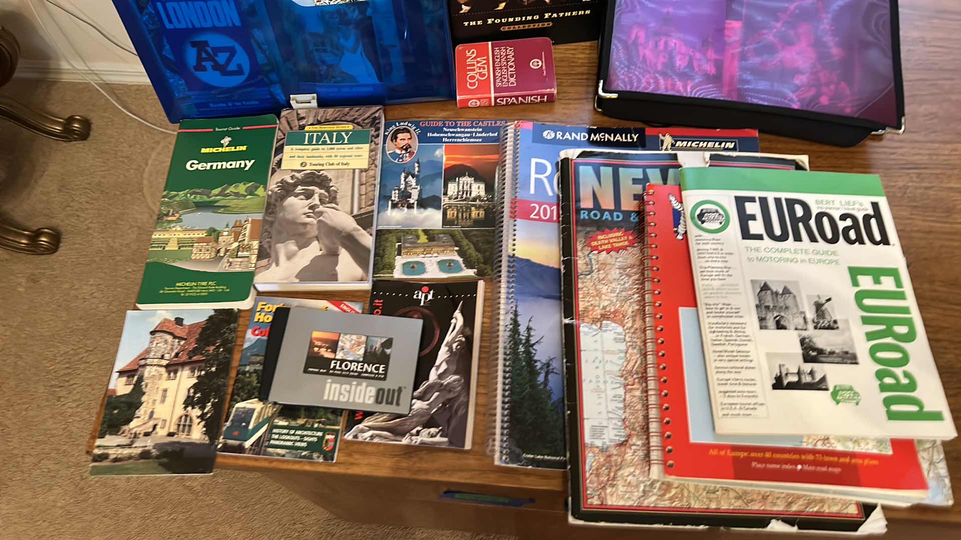 Photo 1 of BOOKS AND MAGAZINES - MAPS AND TRAVEL, CONSUMER REPORTS COLLECTION AND MORE