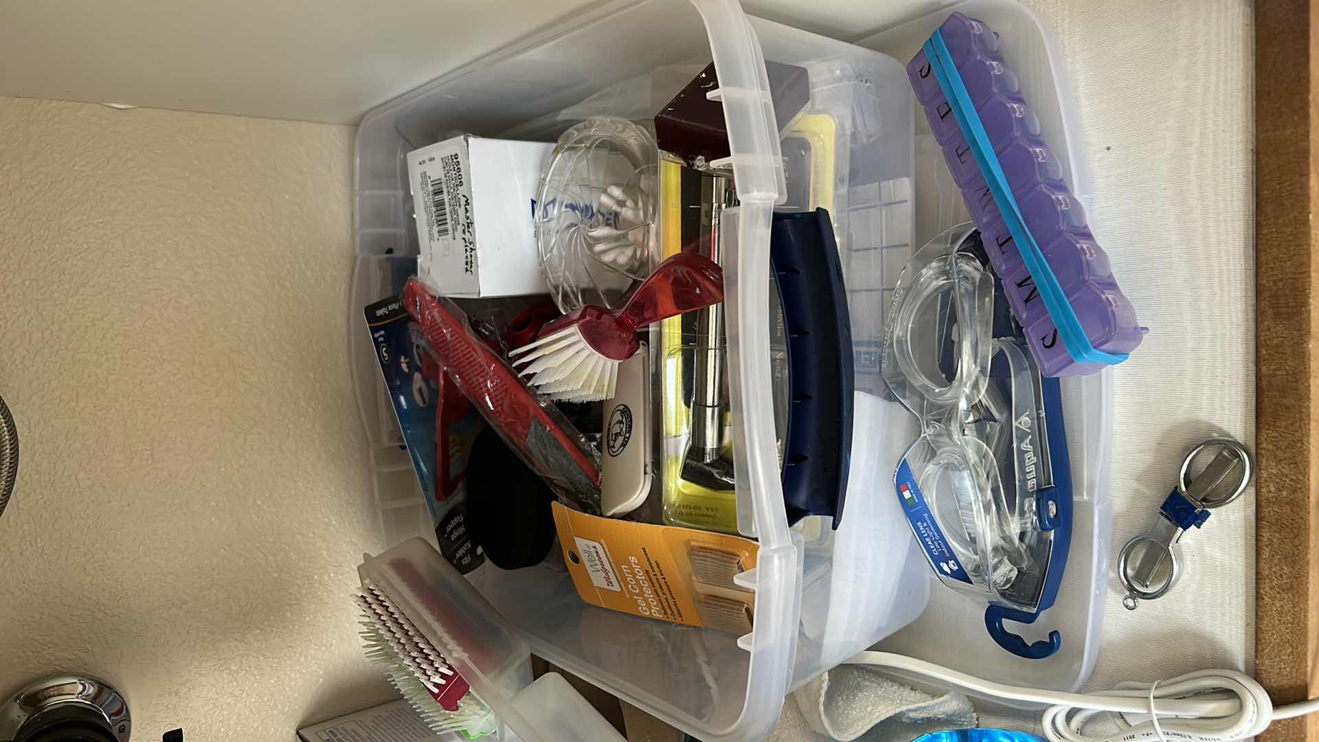 Photo 1 of Contents under sink in bathroom.