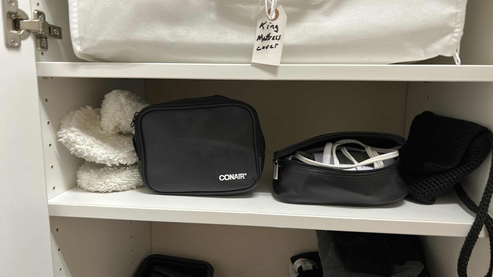 View 5 of Contents of cabinet in walk-in closet