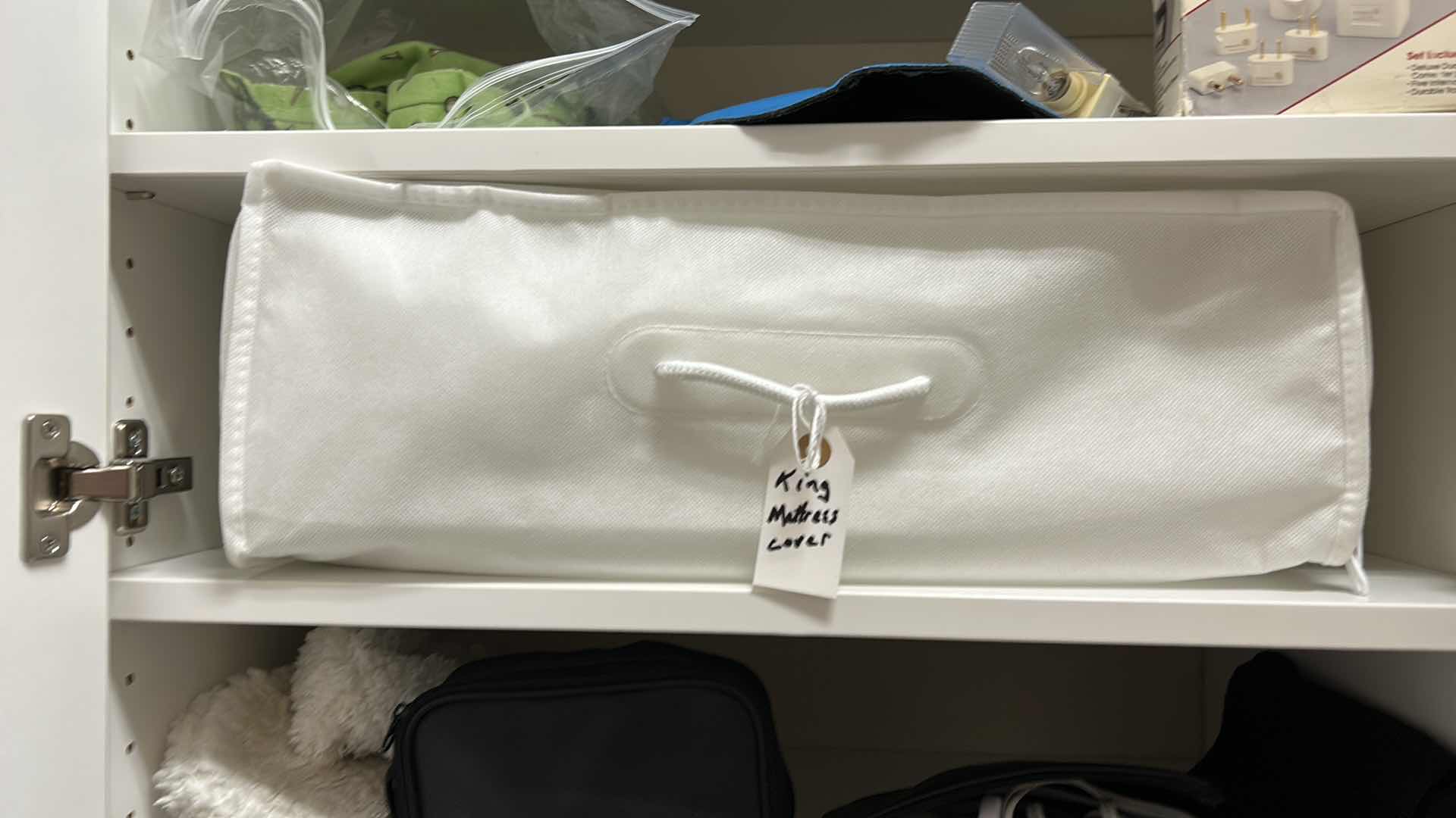View 6 of Contents of cabinet in walk-in closet