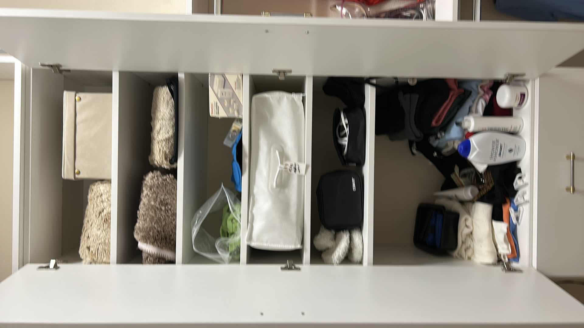 View 9 of Contents of cabinet in walk-in closet