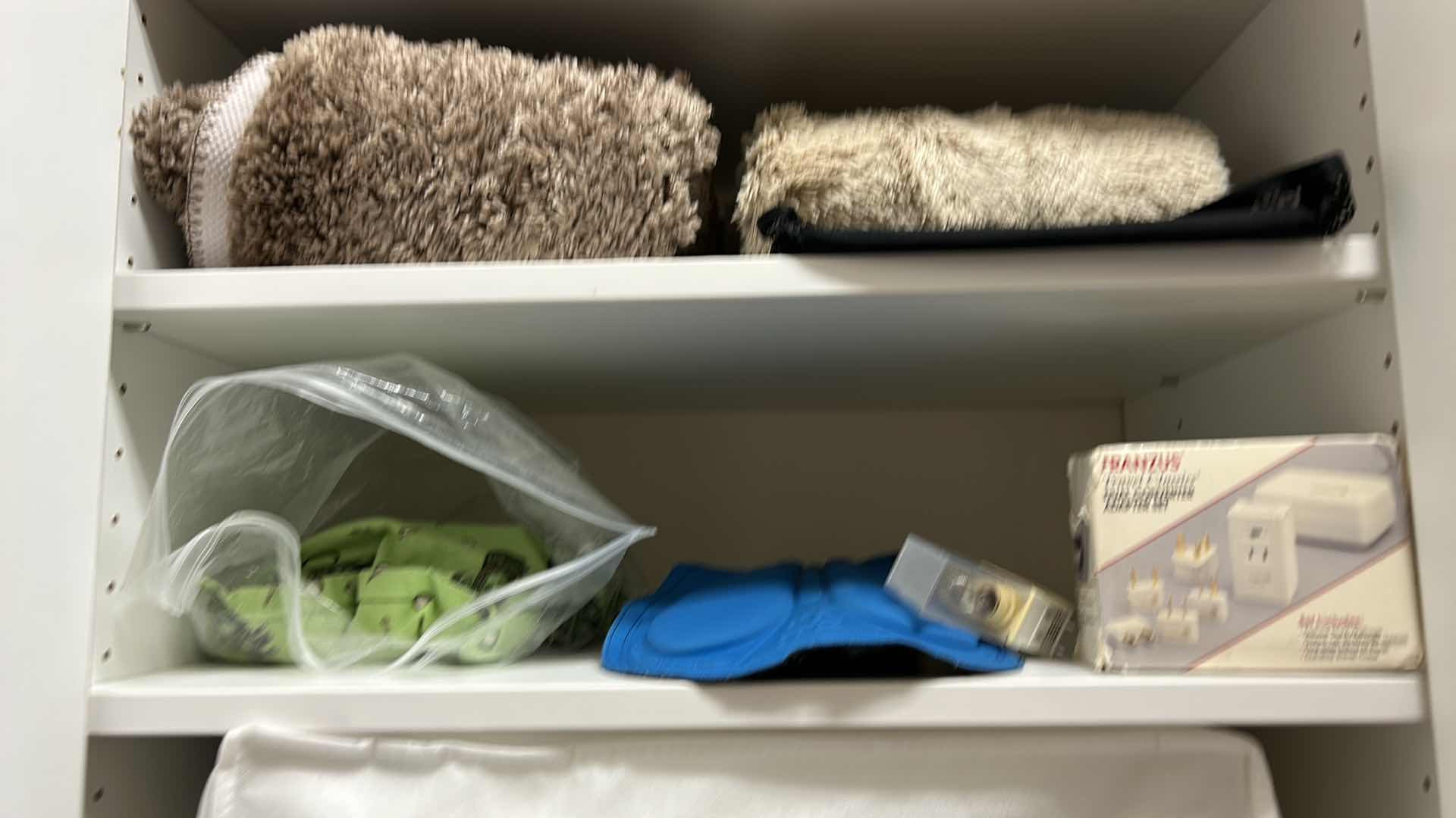 View 7 of Contents of cabinet in walk-in closet