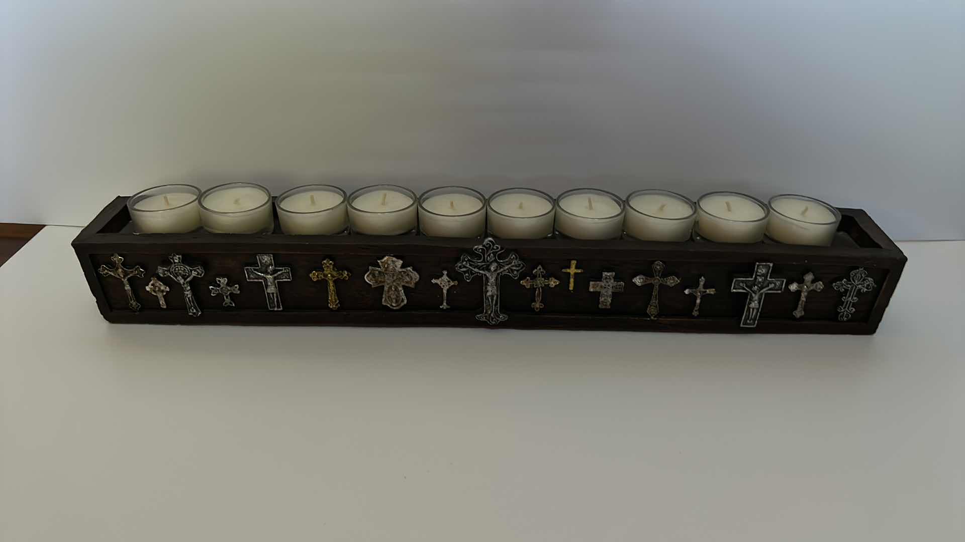 Photo 1 of HOME DECOR - LONG WOOD CANDLE HOLDER WITH VOTIVE CANDLES AND EMBELLISHED METAL CROSSES
