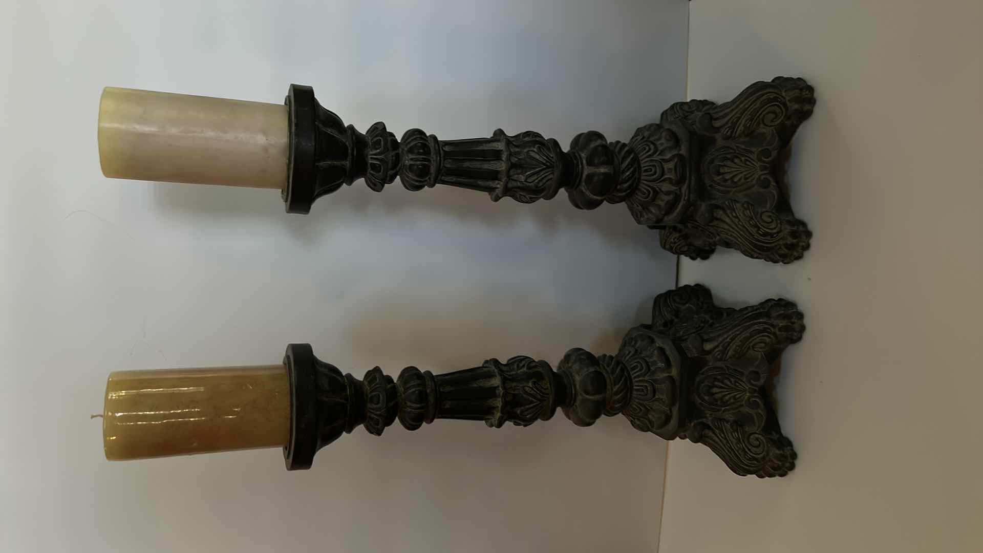 Photo 1 of HOME DECOR 2 -ORNATE CERAMIC AGED CANDLE HOLDERS (HEIGHT WITH CANDLE 26 1/2")