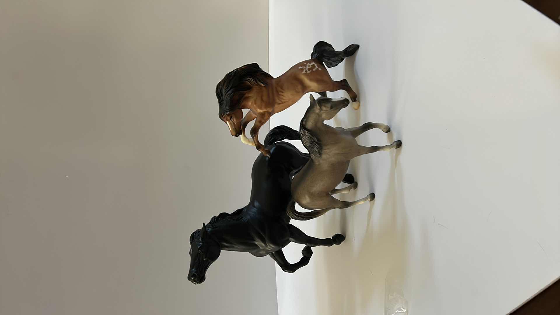 Photo 1 of 3 RESIN HORSE FIGURINES (THE TALLEST IS 10.5")