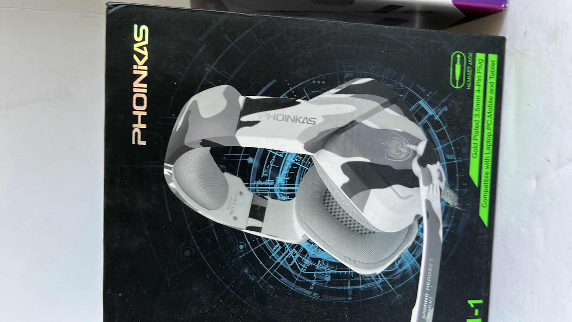 Photo 1 of NEW TECH GEAR - GAMING HEADSET AND WI-FI RANGE EXTENDER