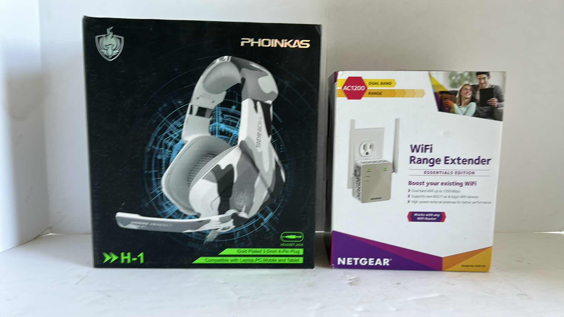 Photo 1 of NEW TECH GEAR - GAMING HEADSET AND WI-FI RANGE EXTENDER