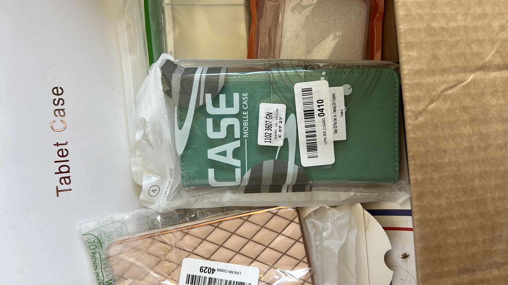 Photo 1 of BOX FULL OF CELL PHONE ACCESSORIES