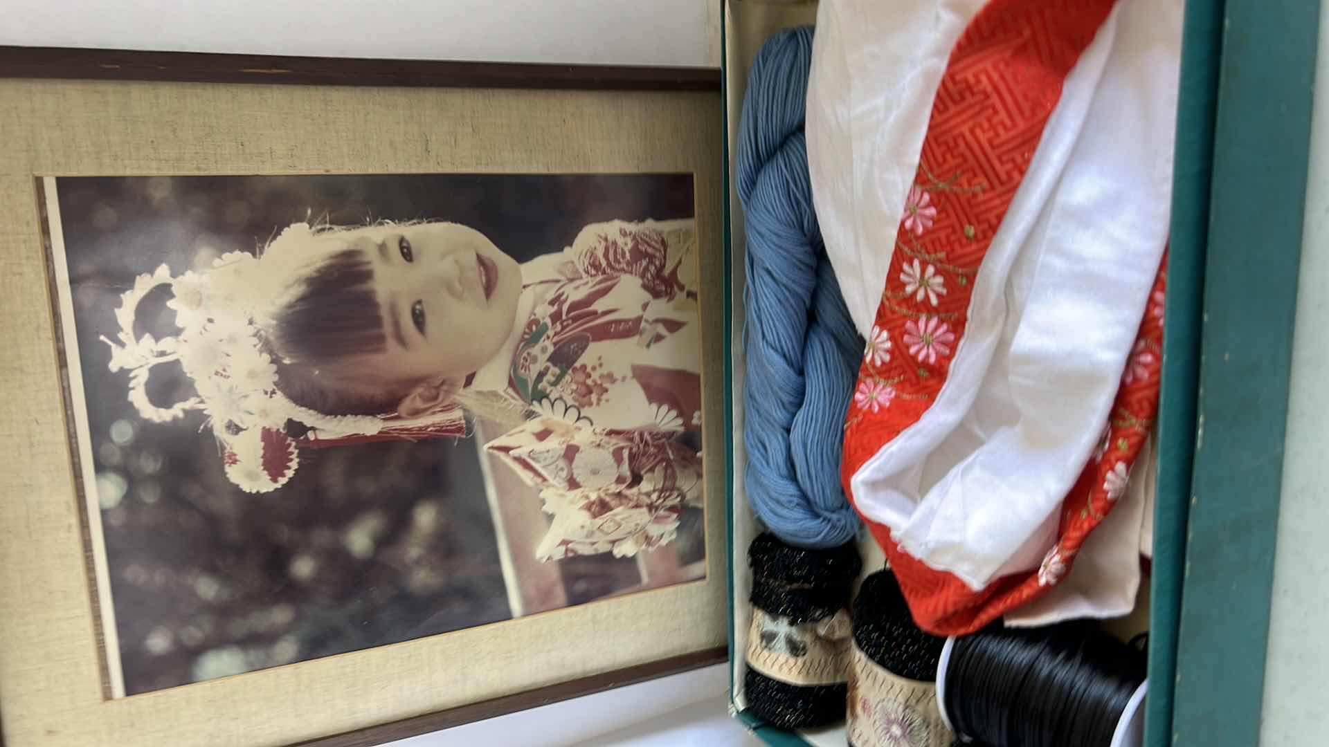 Photo 1 of YOUNG JAPANESE GIRL PHOTO AND BOX WITH YARN AND JAPANESE TOP (FRAMED PHOTO ARTWORK 141/2” x 18”)