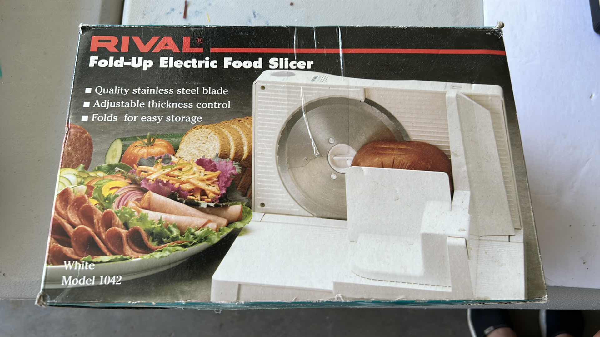 Photo 1 of RIVAL FOLD UP ELECTRIC FOOD SLICER