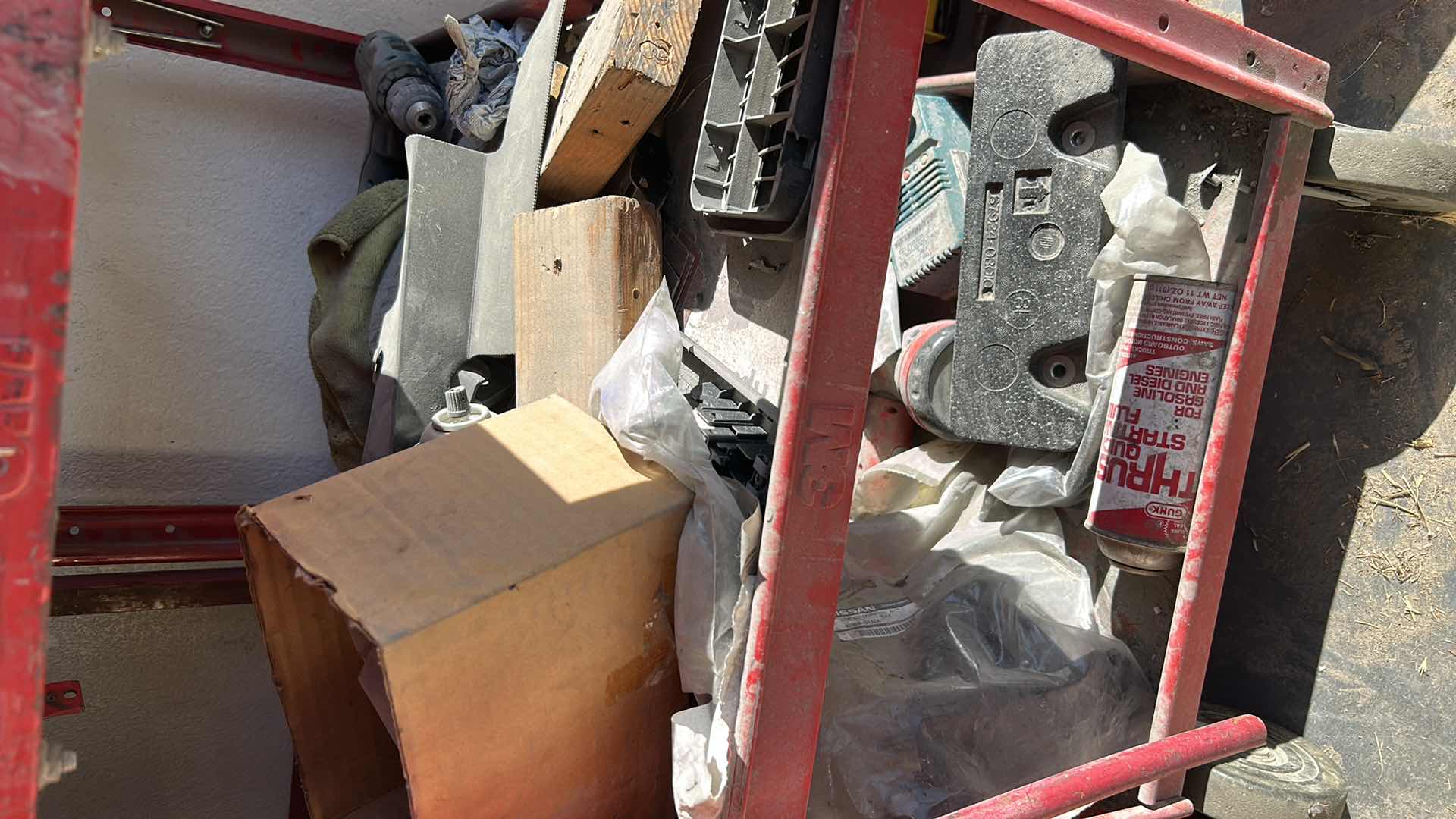 Photo 1 of HEAVY LARGE METAL ROLLING SHELVES WITH CONTENTS TOOLS AND PARTS 