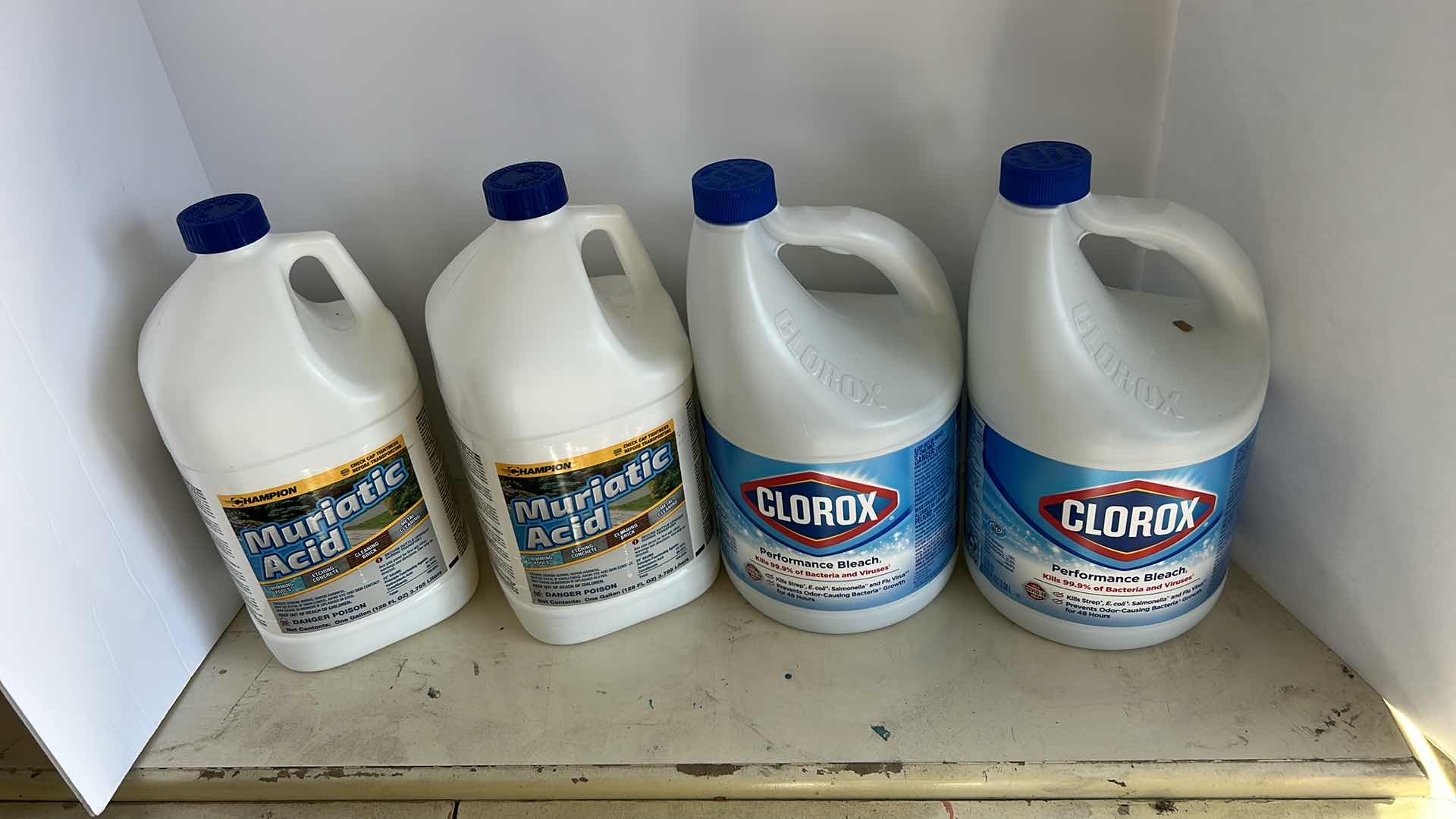 Photo 1 of TWO NEW CONTAINERS OF MURIATIC ACID AND TWO NEW CONTAINERS OF CLORAX BLEACH 