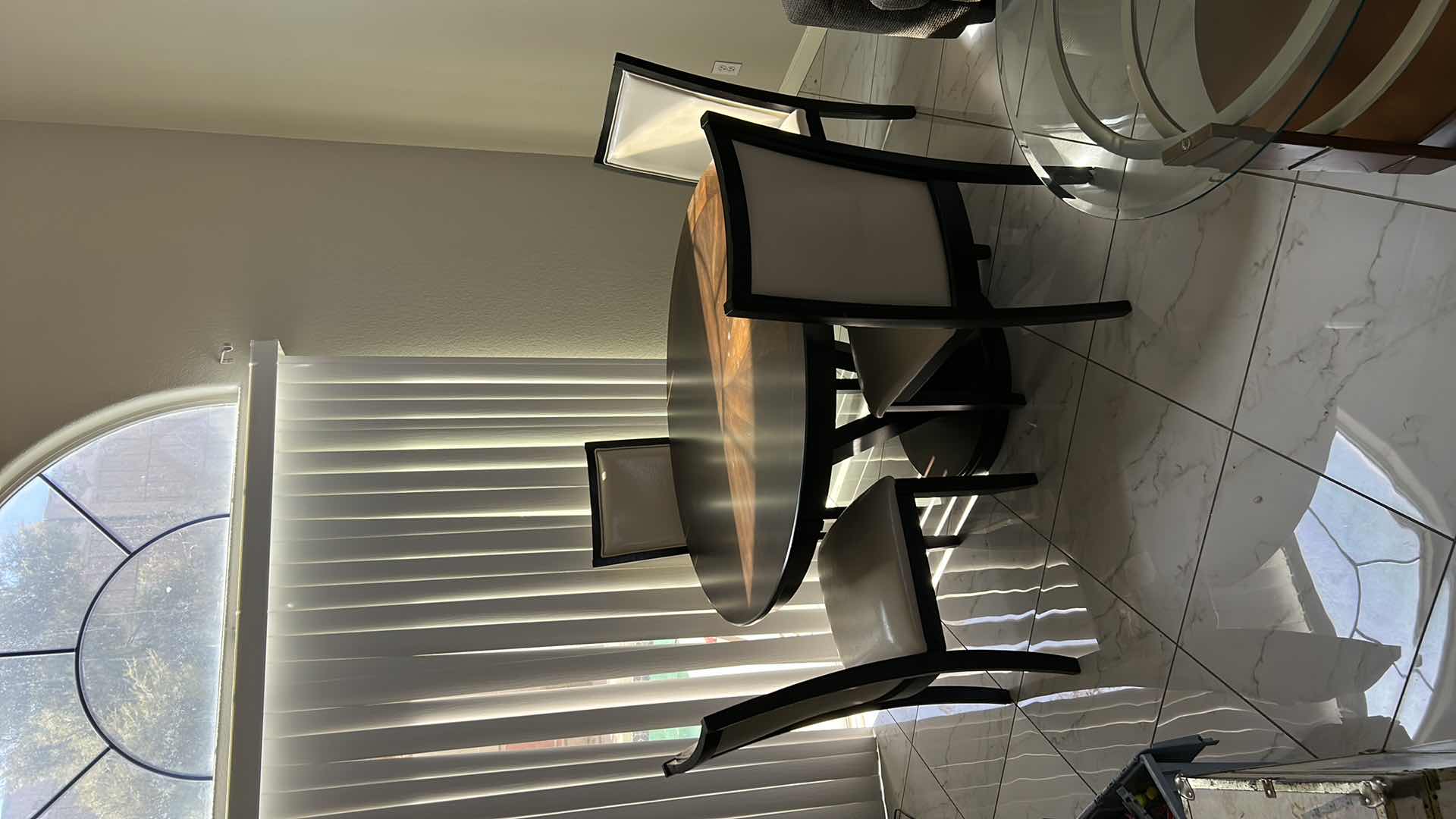 Photo 1 of ROUND WOOD TABLE WITH 4 CHAIRS 53” x 30”