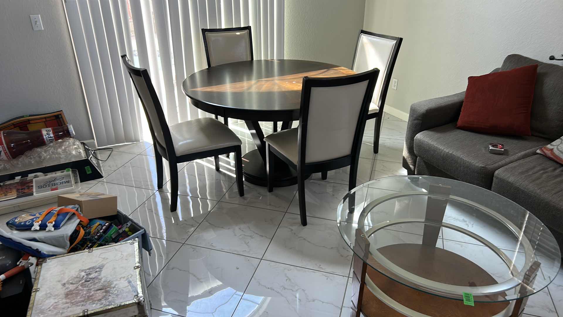 Photo 1 of ROUND WOOD TABLE WITH 4 CHAIRS 53” x 30”