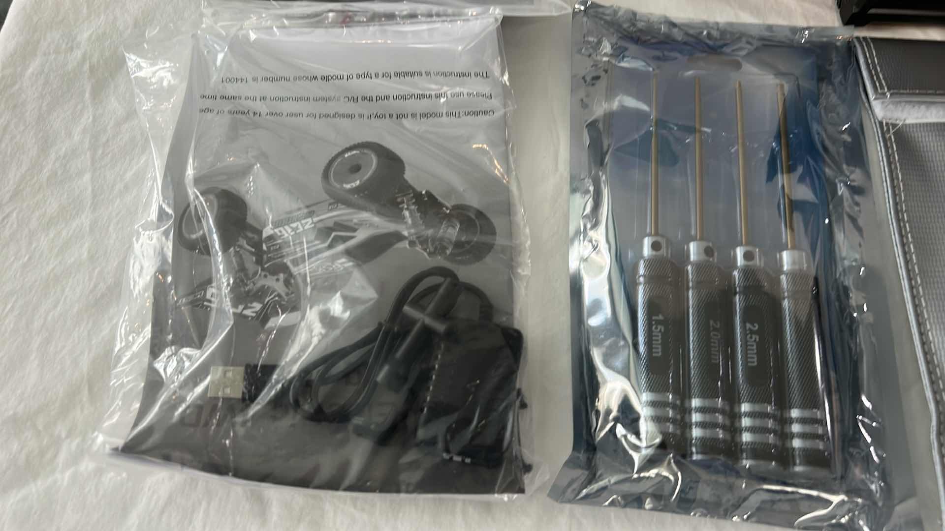 Photo 5 of RC BATTERY ASSORTMENT AND TOOLS