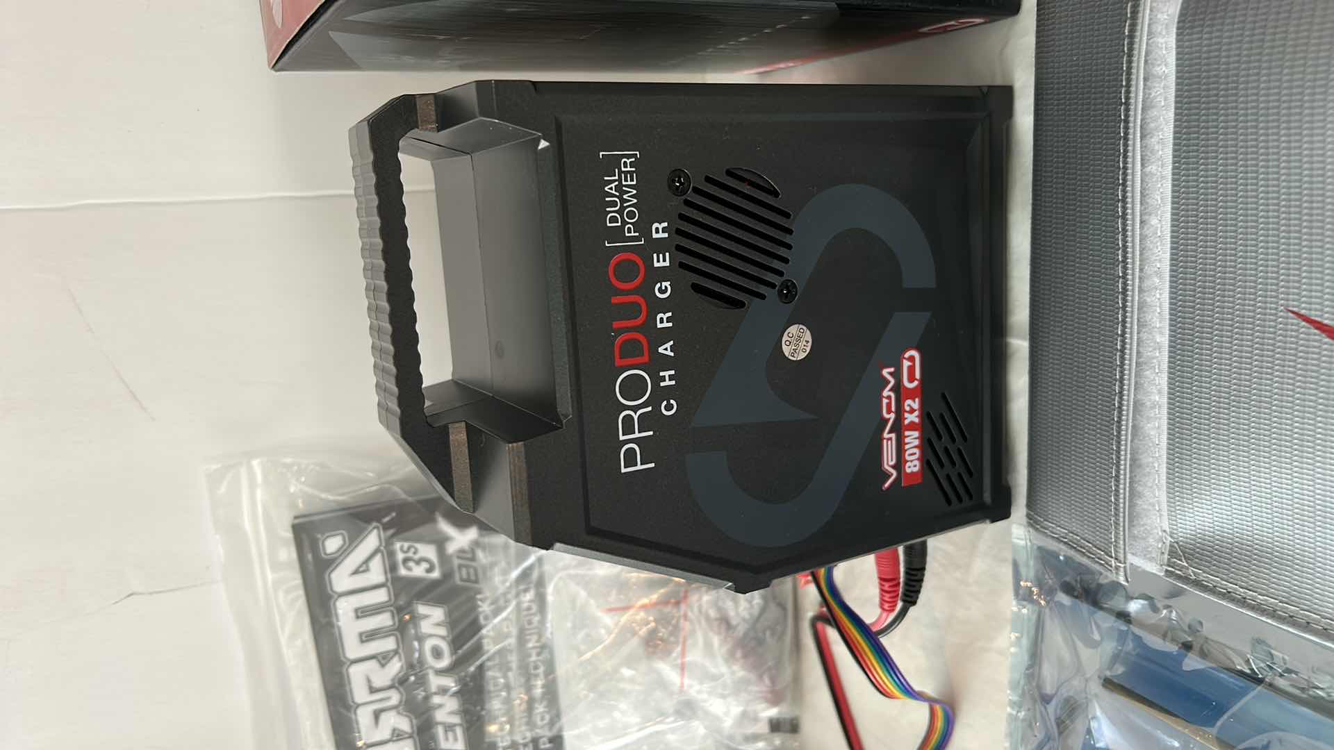 Photo 2 of RC BATTERY ASSORTMENT AND TOOLS