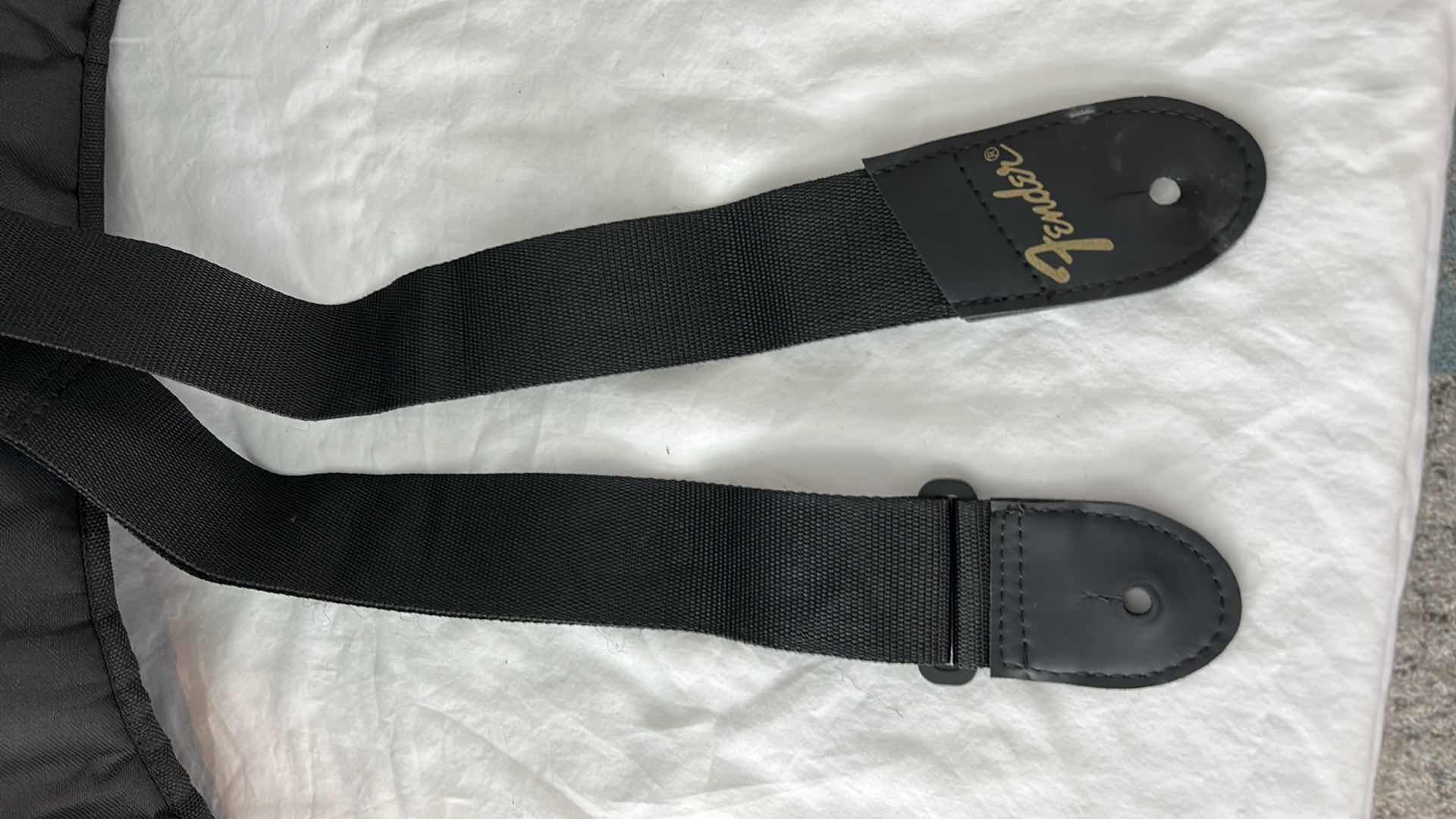 Photo 1 of FENDER GUITAR GIG BAG AND GUITAR STRAP