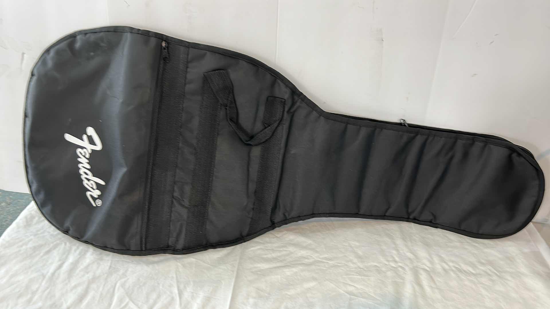 Photo 1 of FENDER GUITAR GIG BAG AND GUITAR STRAP