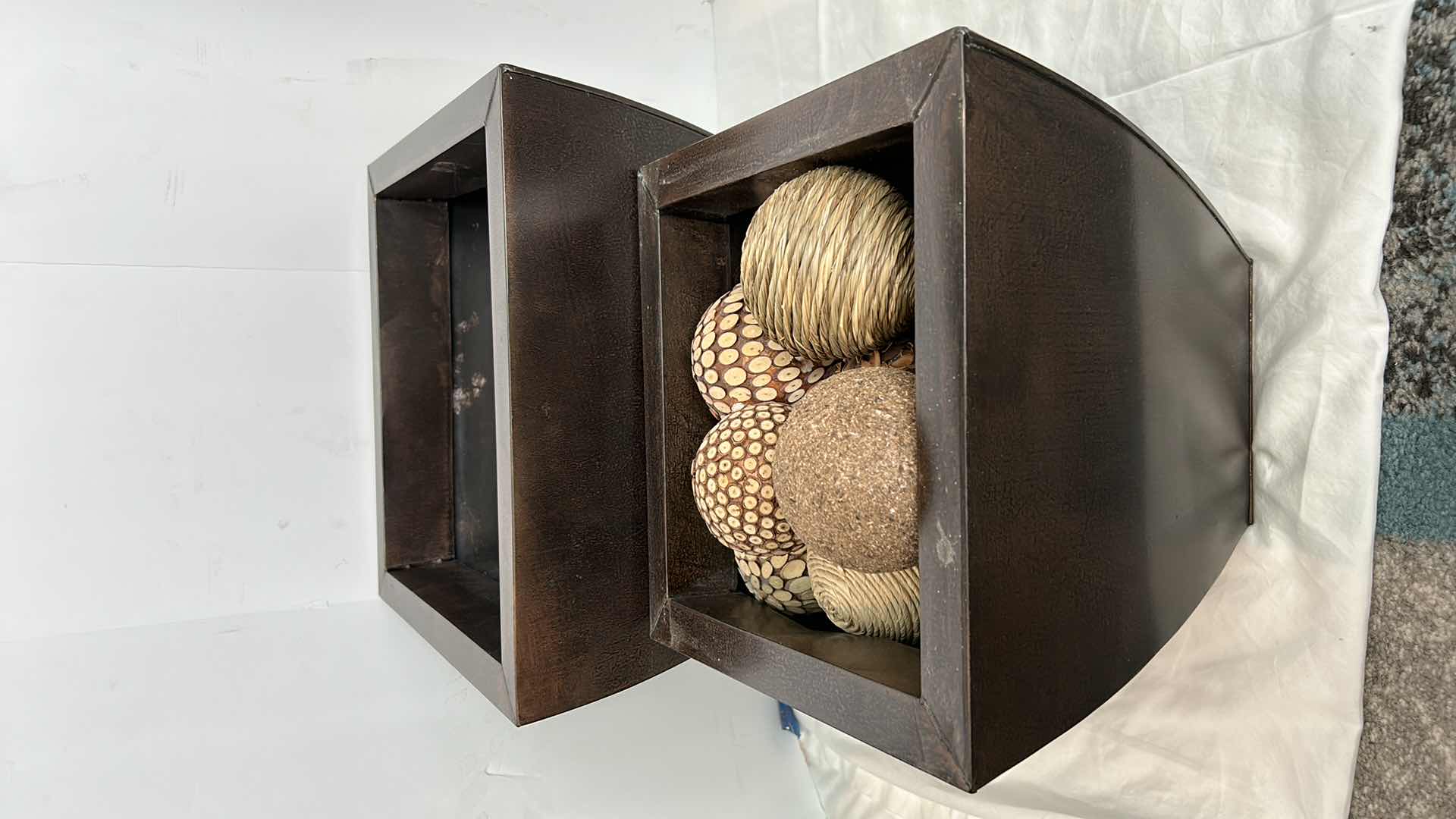 Photo 1 of HOME DECOR - TWO TIN BLOWN PLANTERS AND ASSORTMENT BALLS TALLEST IS 16” x 15”