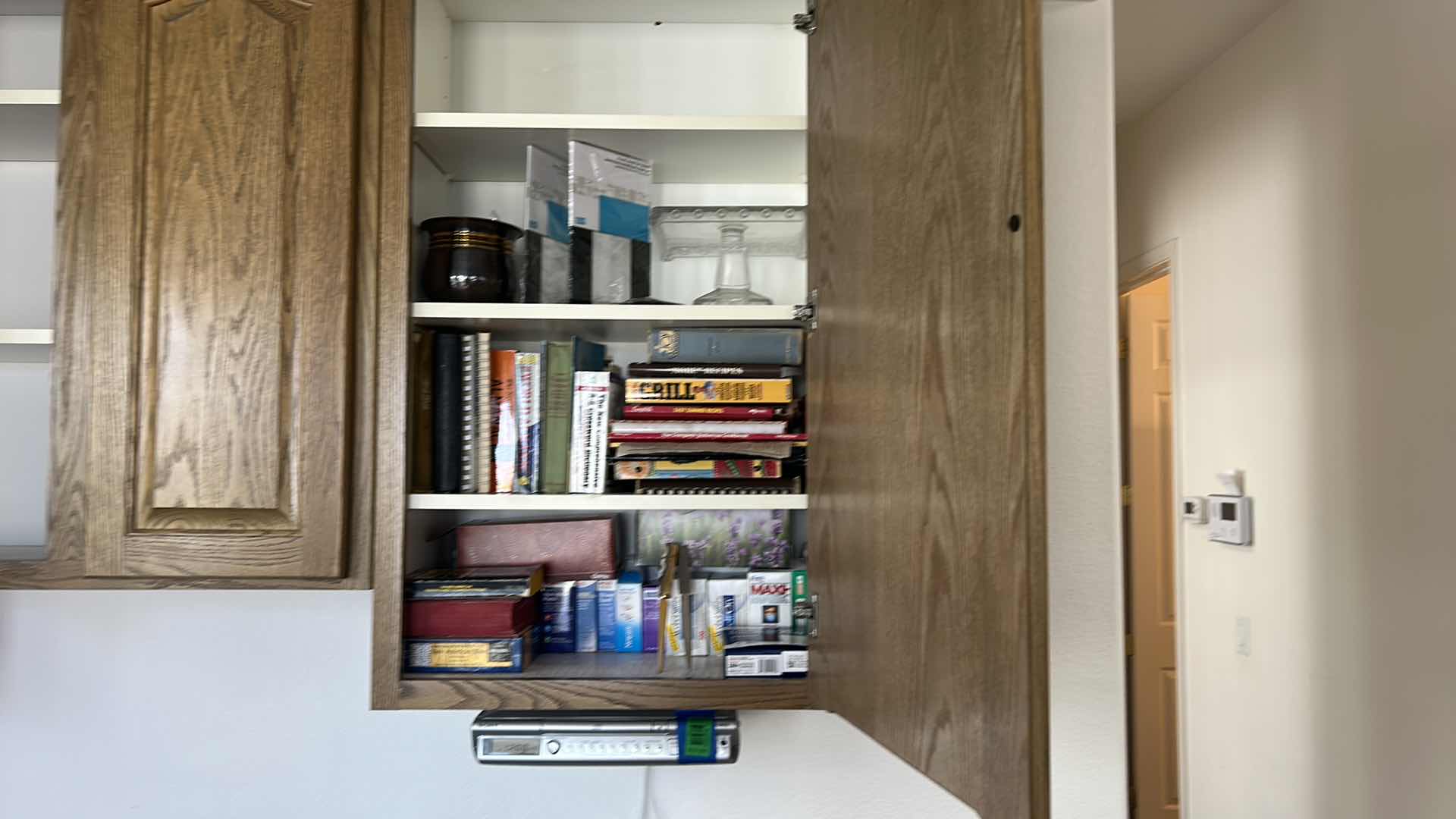 Photo 1 of CONTENTS OF KITCHEN CABINET