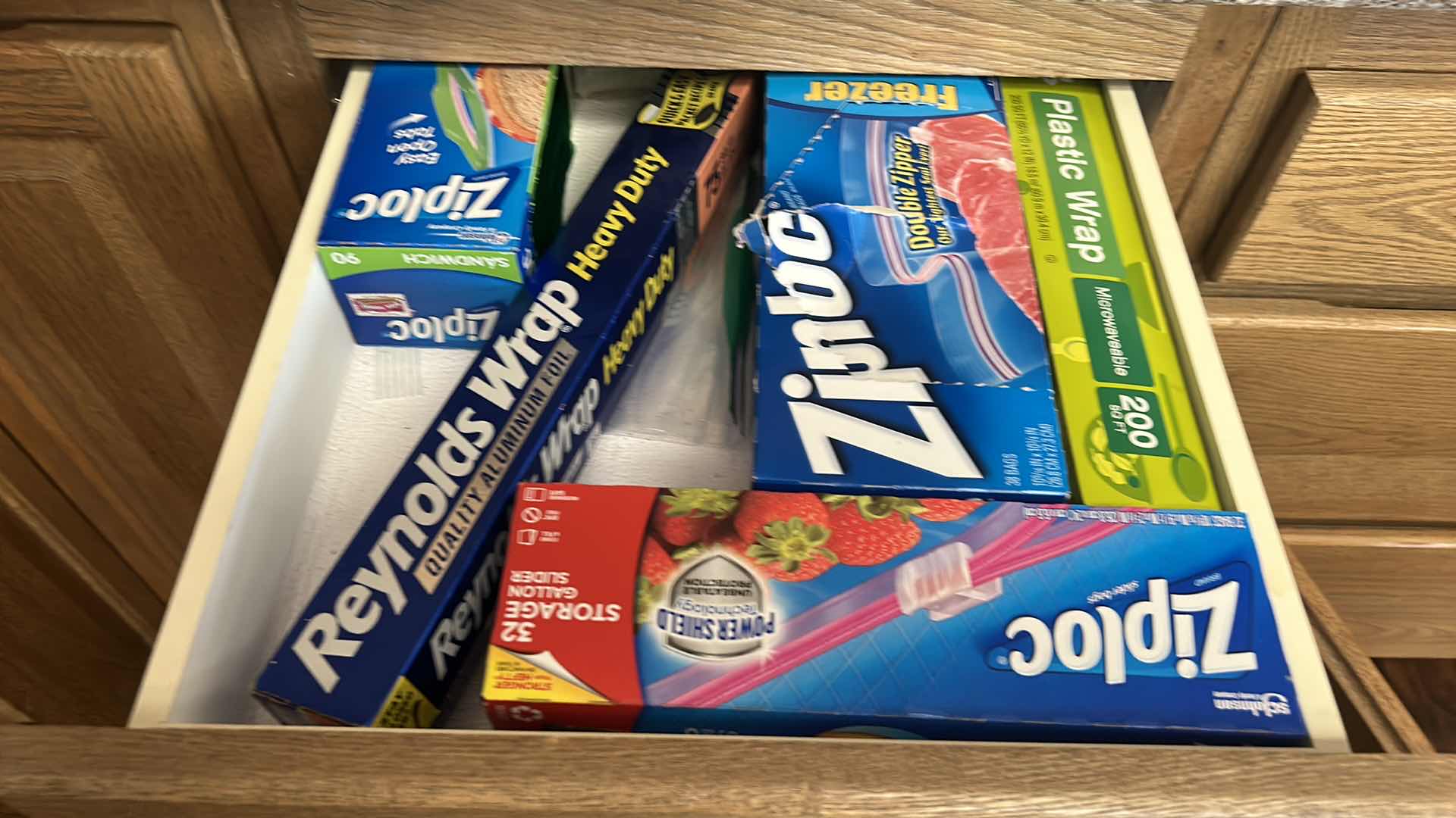 Photo 2 of CONTENTS OF KITCHEN CABINET AND DRAWER