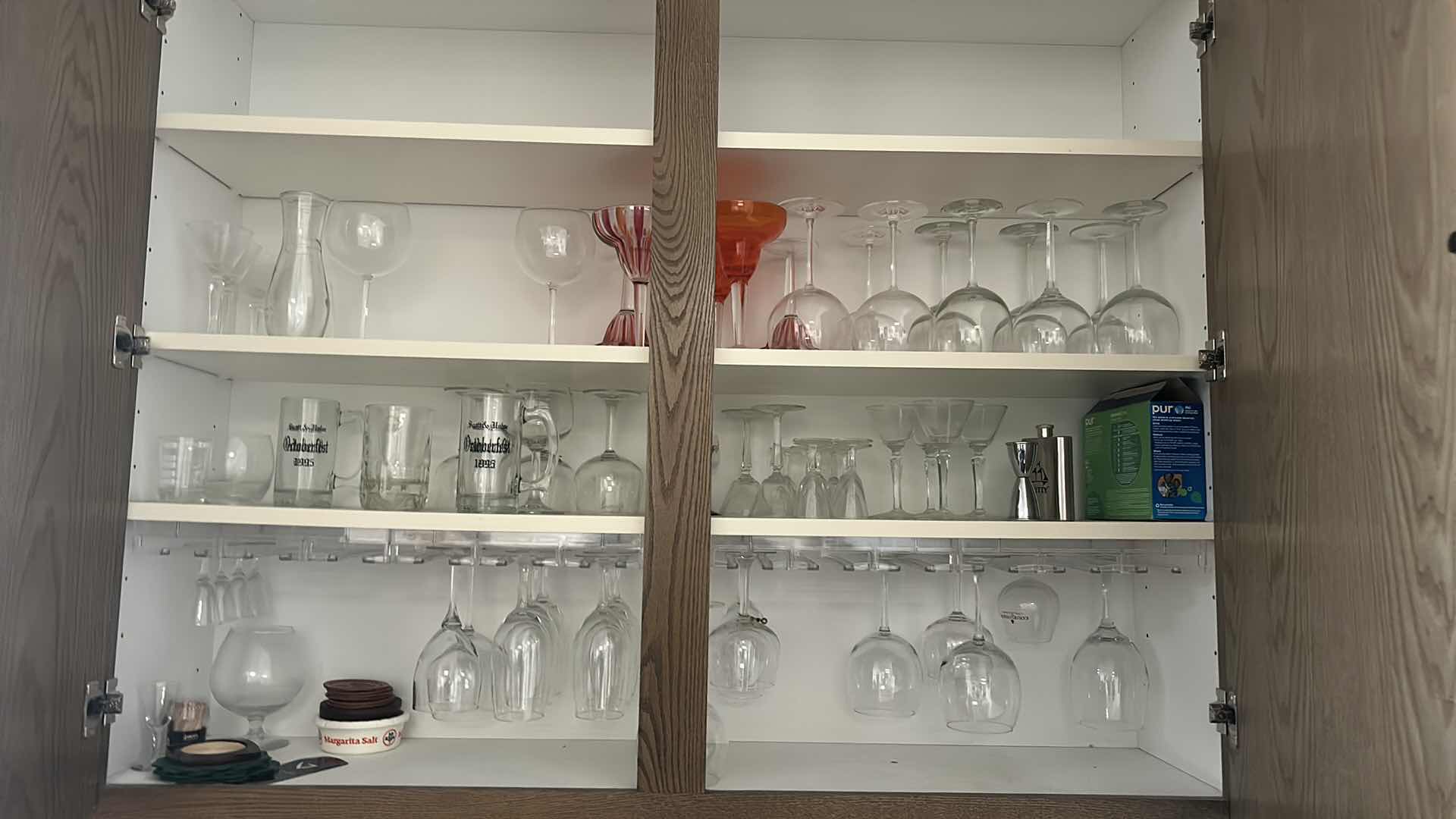 Photo 1 of CONTENTS OF CABINET IN BAR