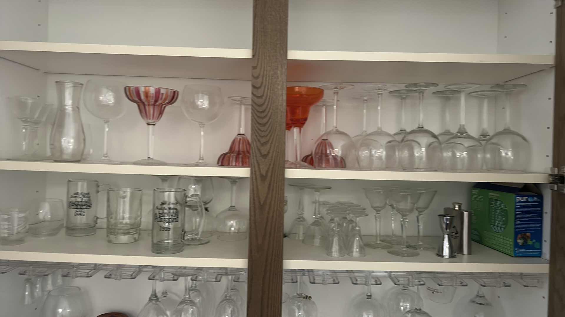 Photo 1 of CONTENTS OF CABINET IN BAR