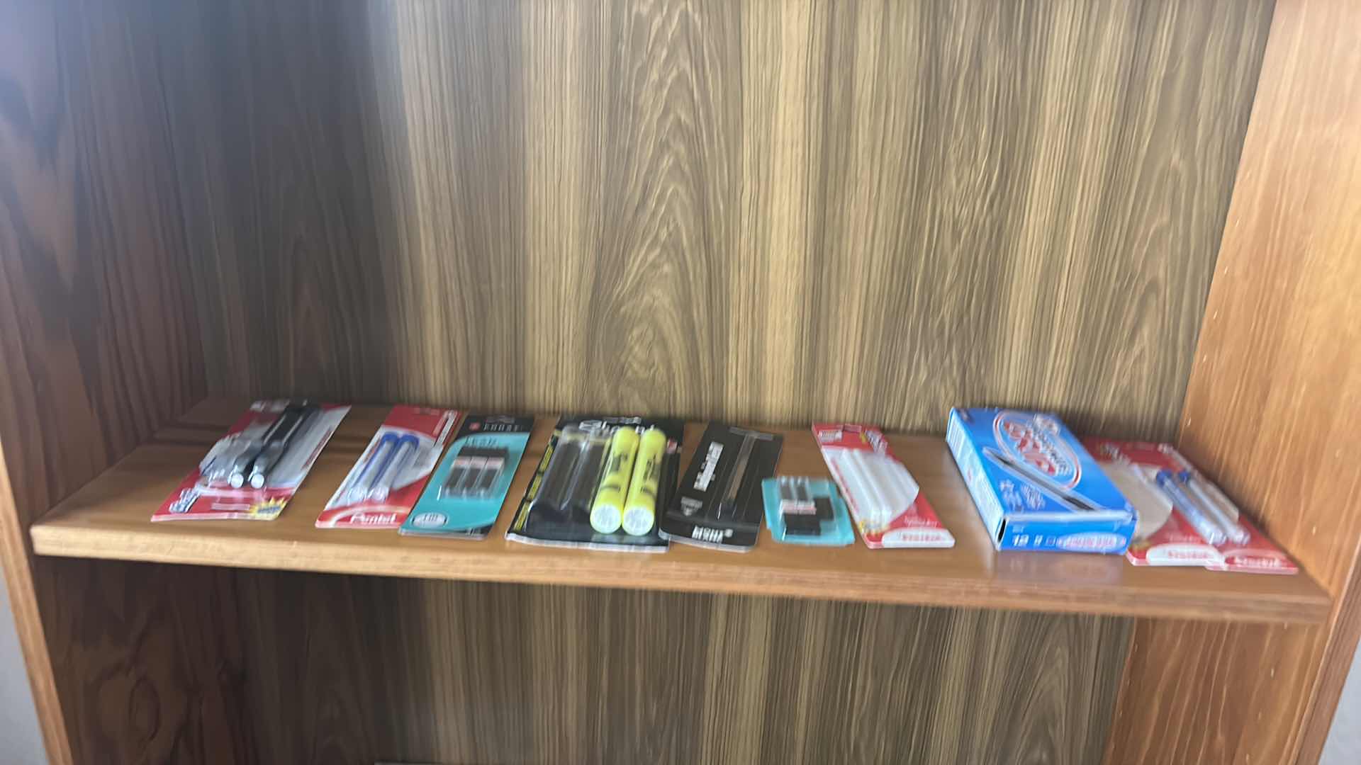 Photo 1 of BOOKSHELVES WITH OFFICE SUPPLIES 30” x 9 1/4” x 70”