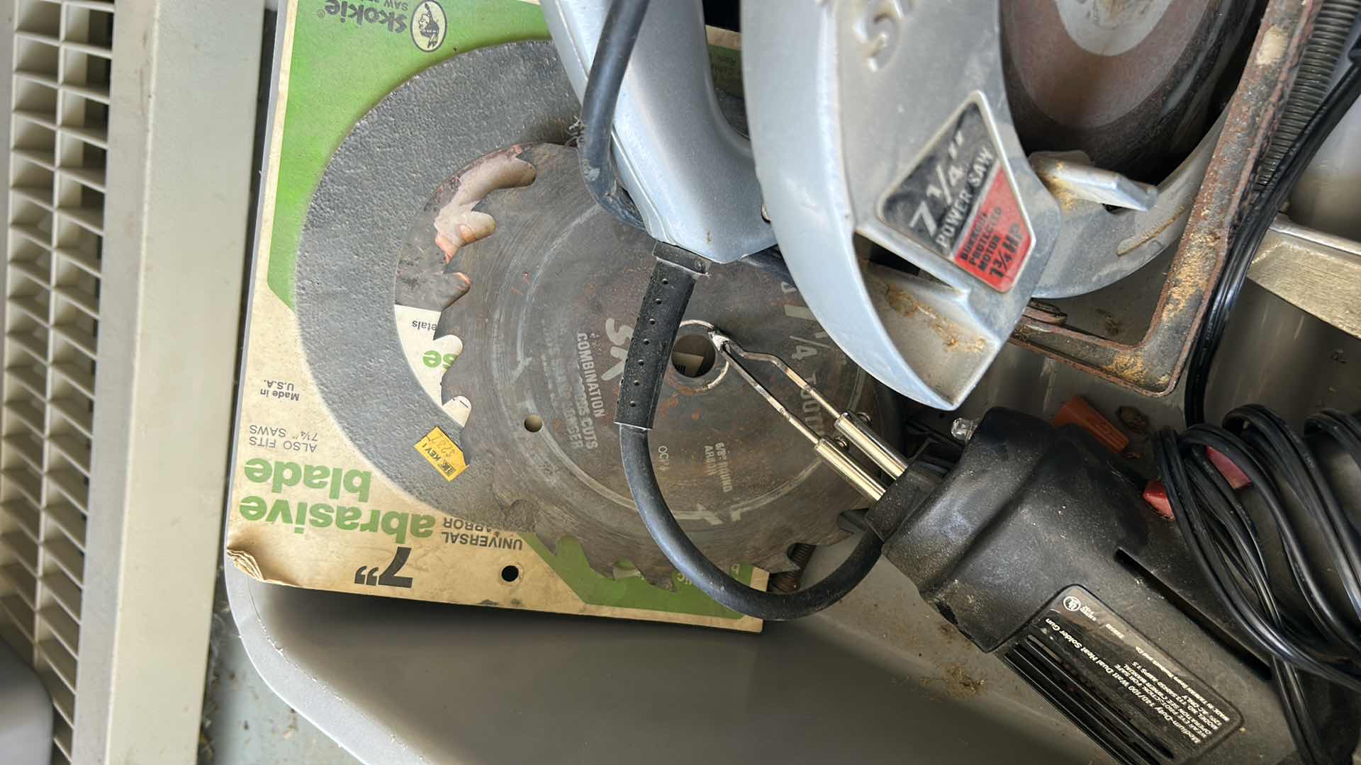 Photo 1 of SKILLSAW, BLADES, HATCHET AND SOLDER GUN