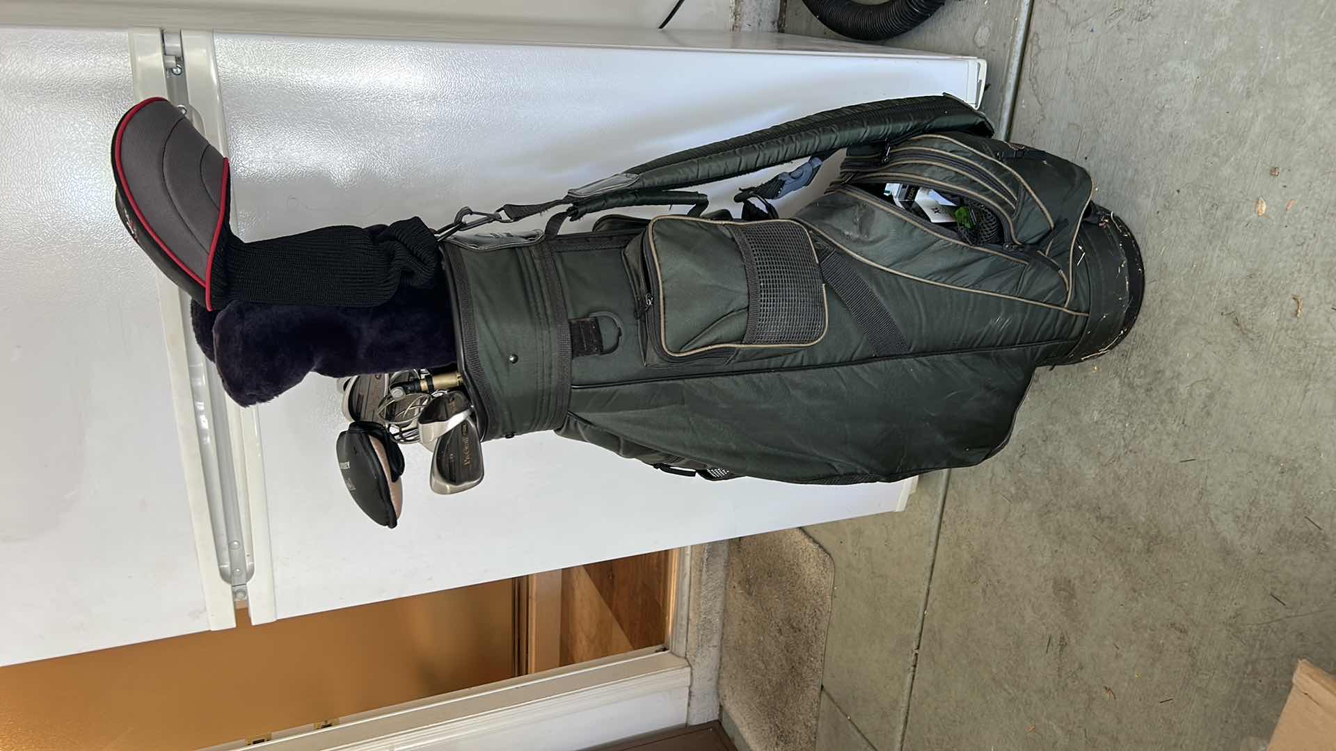 Photo 1 of GOLF BAG WITH CLUBS, BALLS AND ACCESSORIES