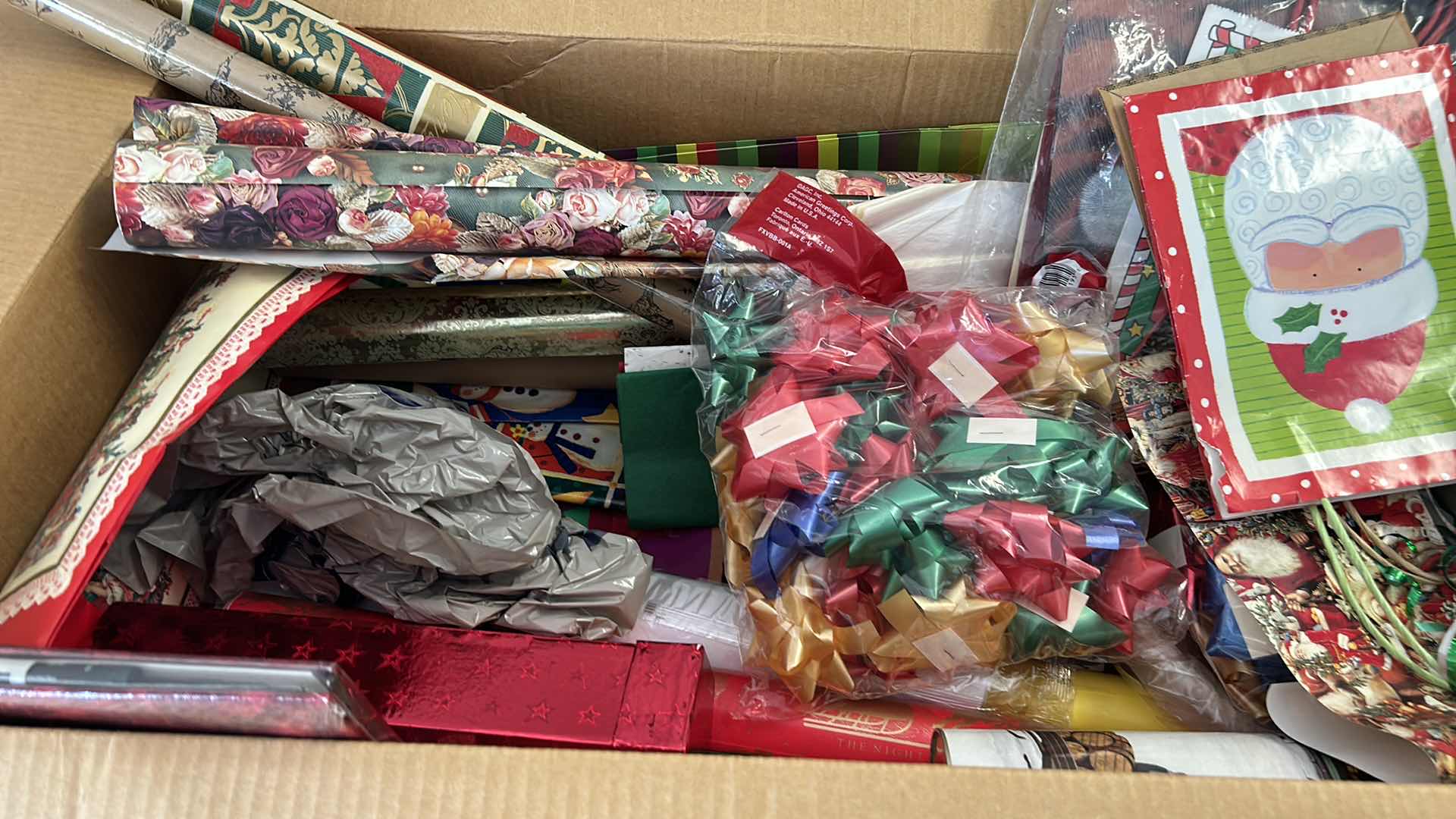 Photo 1 of LARGE BOX OF CHRISTMAS WRAP