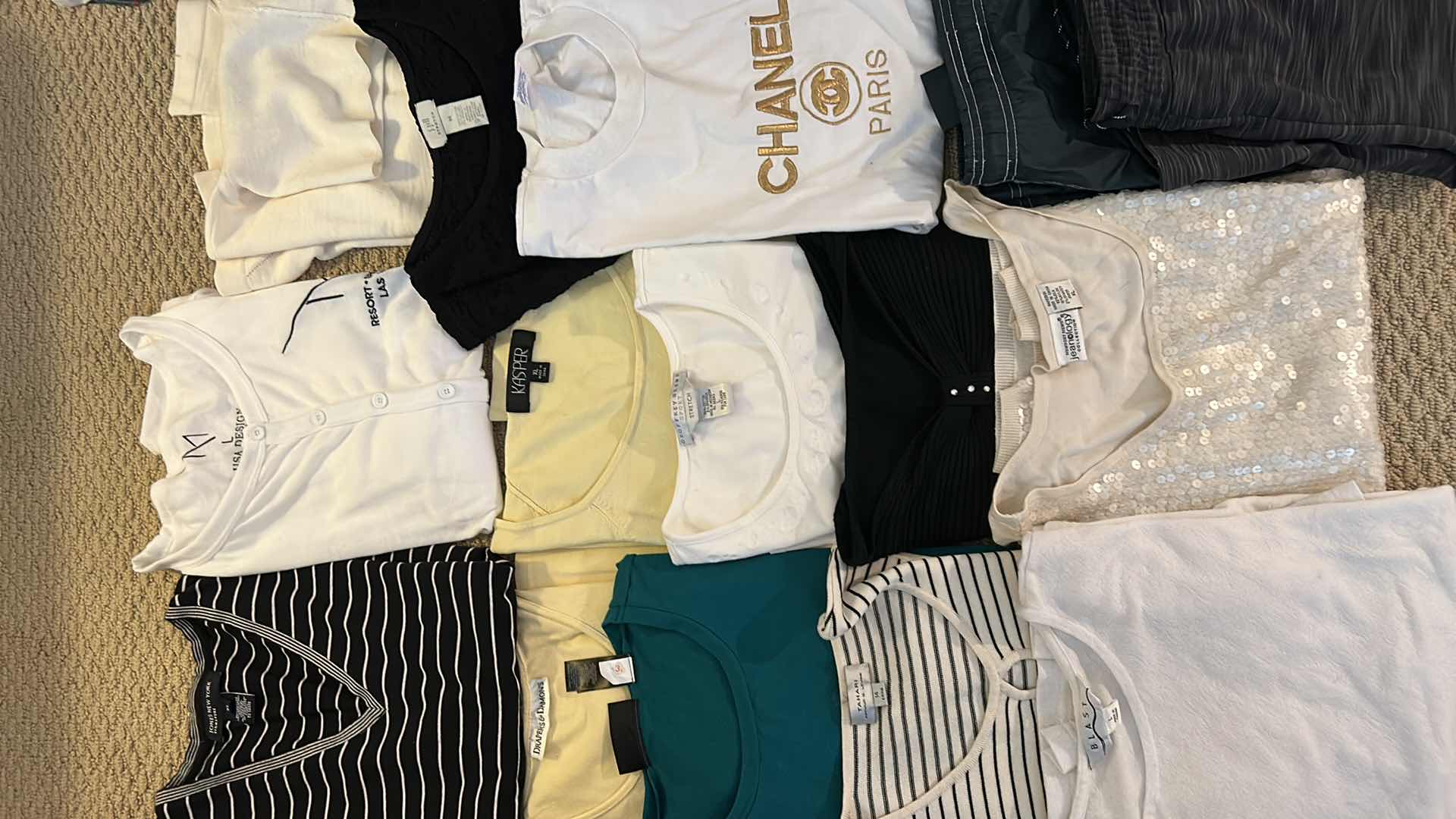 Photo 1 of WOMENS CLOTHING ASSORTMENT L AND XL