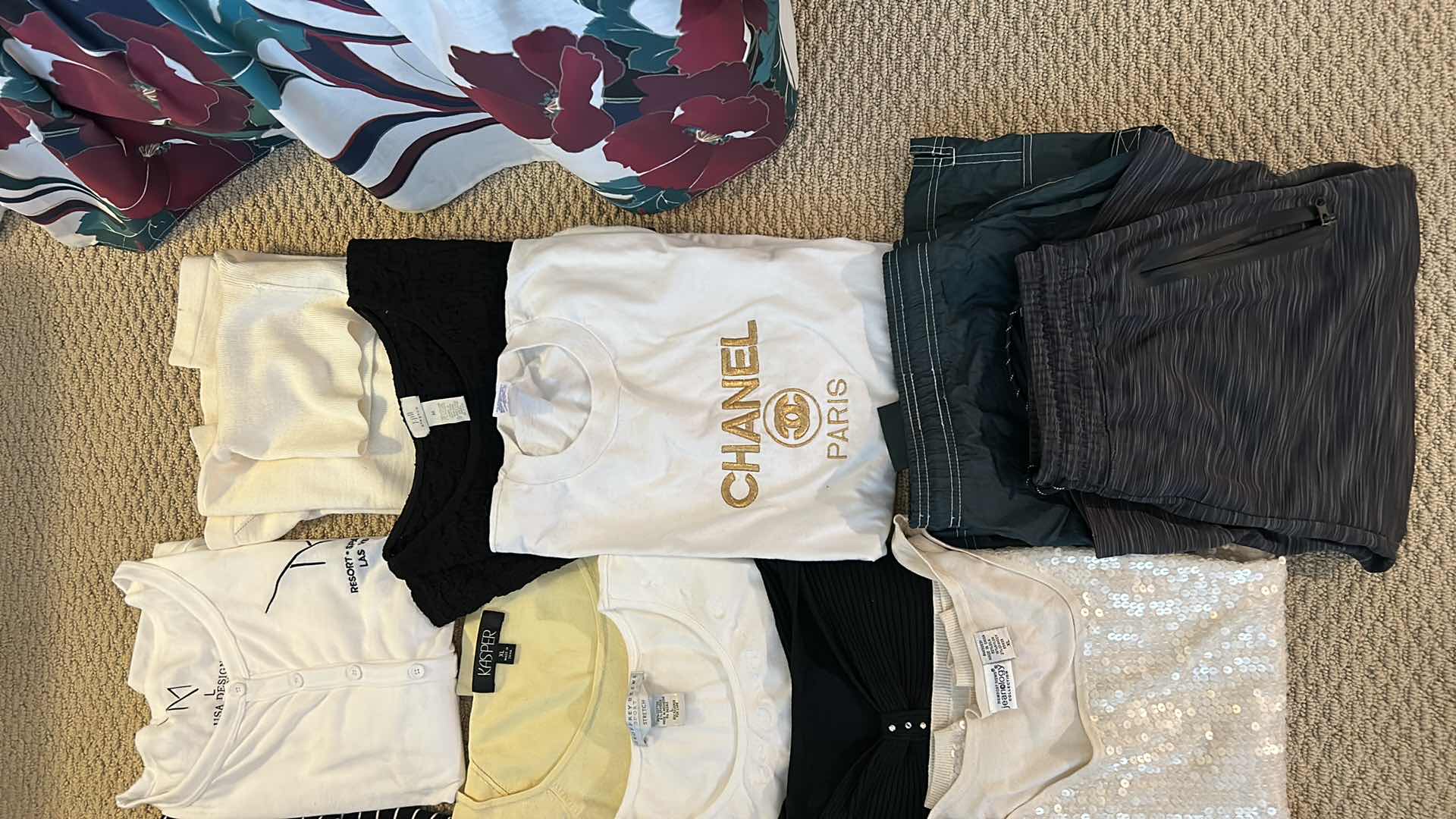 Photo 1 of WOMENS CLOTHING ASSORTMENT L AND XL