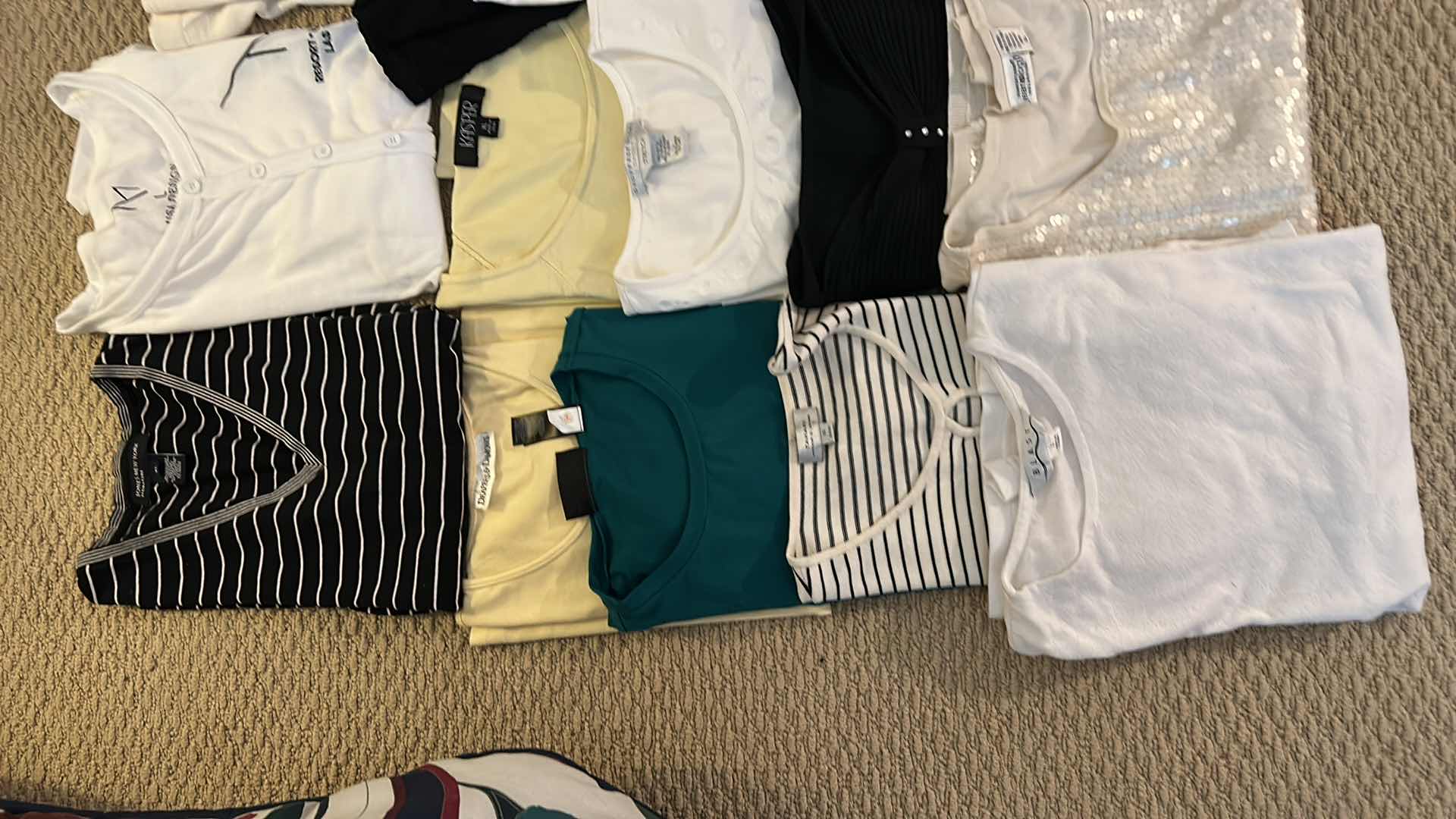 Photo 1 of WOMENS CLOTHING ASSORTMENT L AND XL