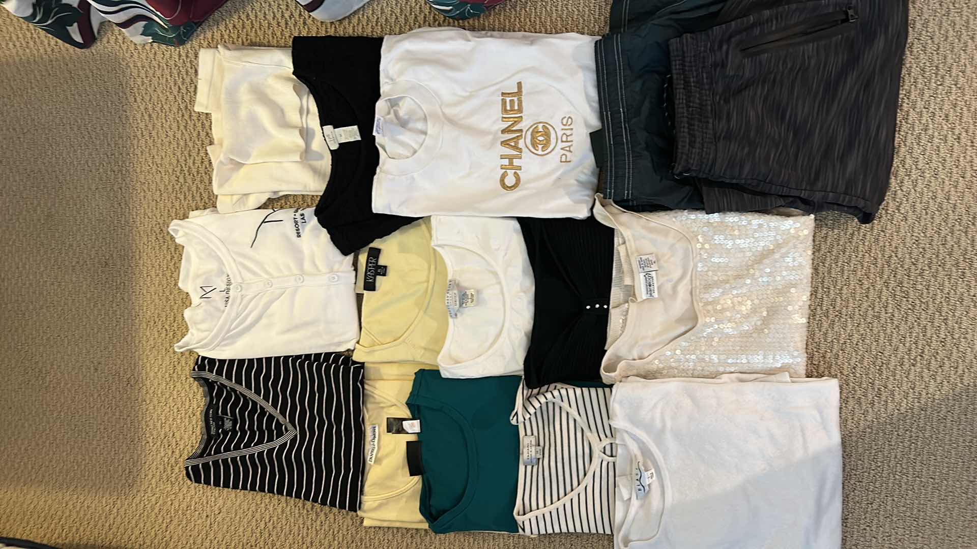 Photo 1 of WOMENS CLOTHING ASSORTMENT L AND XL