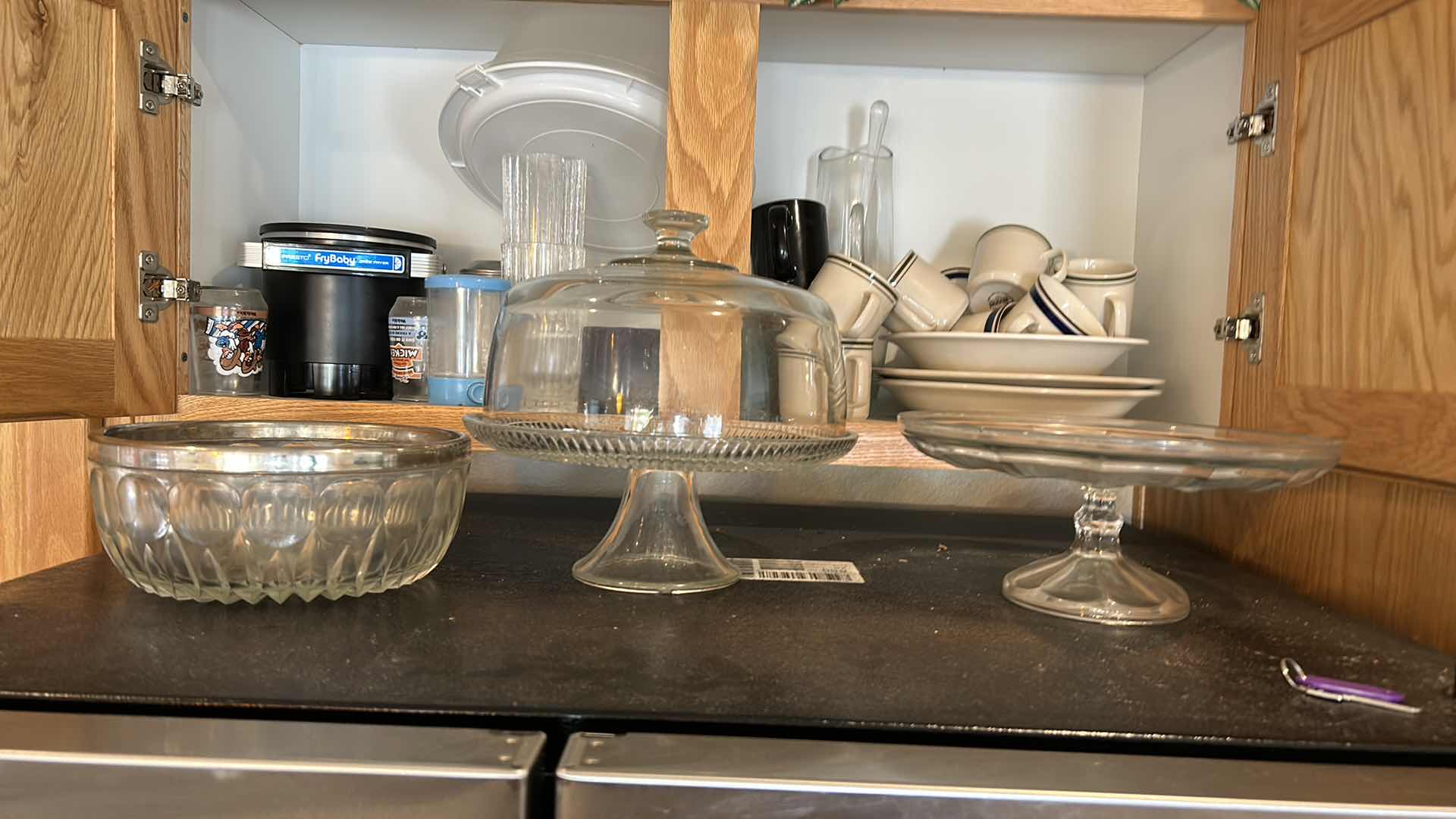 Photo 4 of CONTENTS OF KITCHEN CABINET AND TOP OF REFRIGERATOR