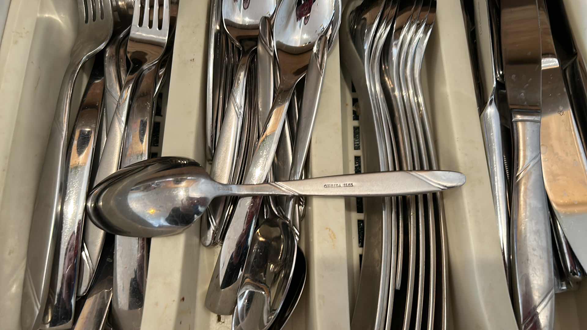 Photo 1 of CONTENTS OF KITCHEN DRAWER -  ONEIDA SILVERWARE AND MORE