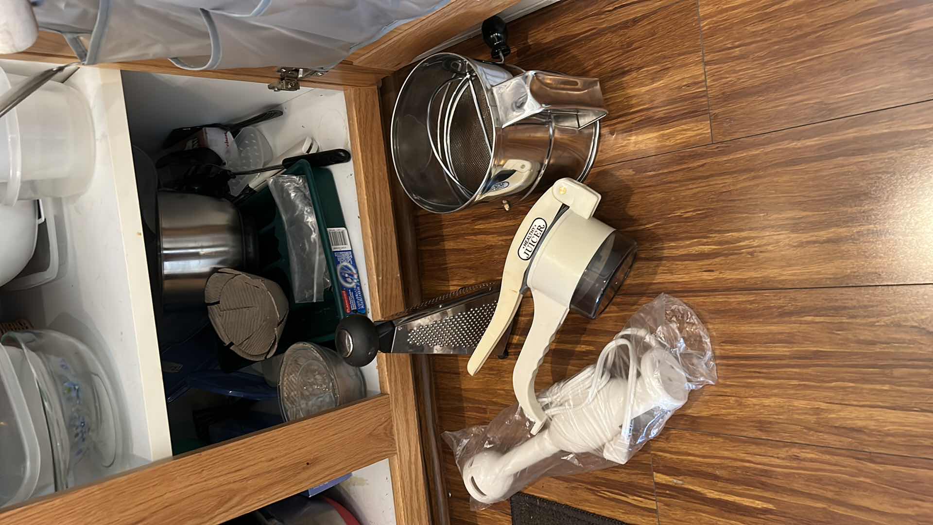 Photo 1 of CONTENTS OF KITCHEN CABINET