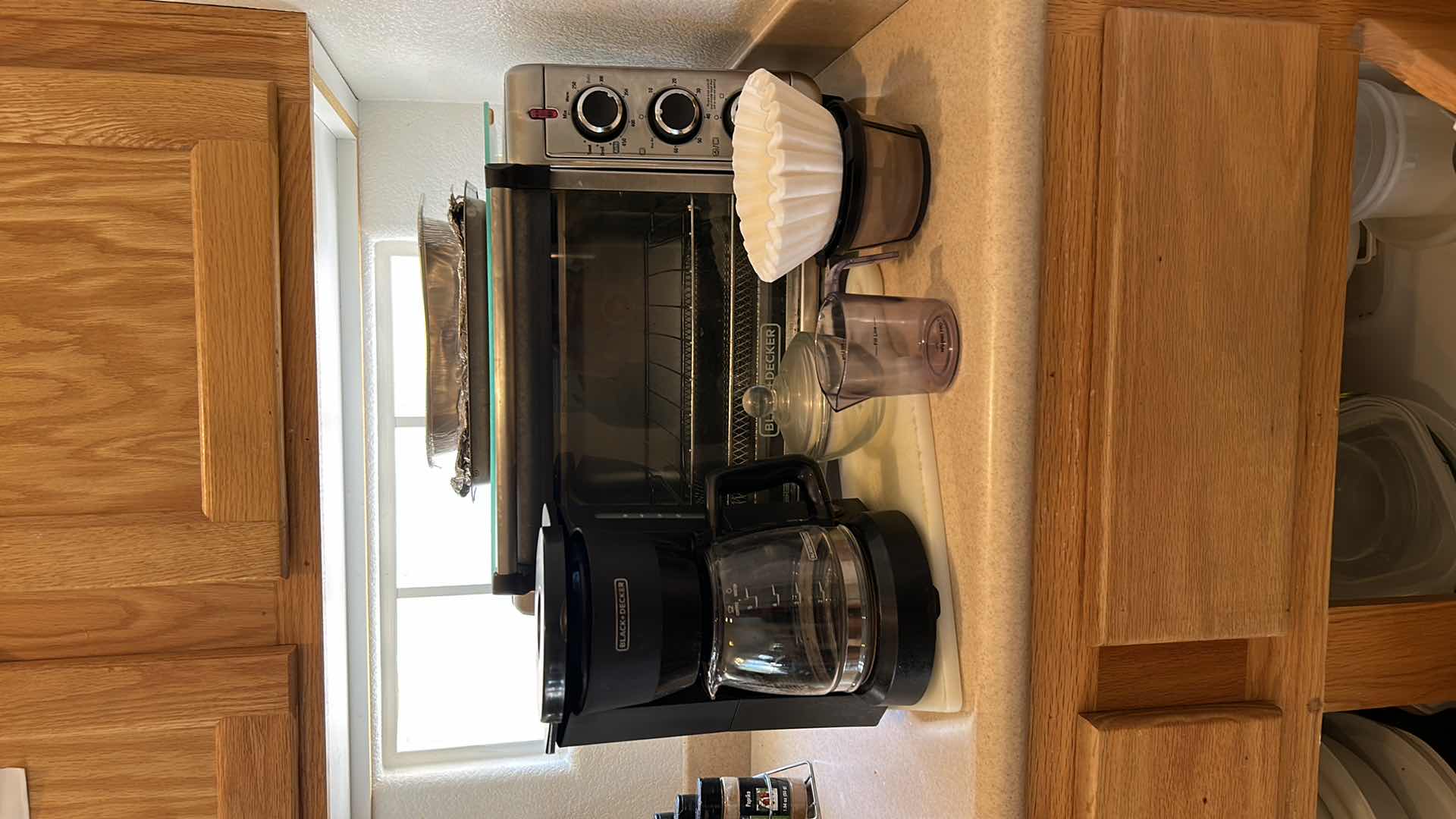 Photo 1 of KITCHEN APPLIANCES - BLACK AND DECKER TOASTER OVEN, COFFEE MAKER AND ACCESSORIES