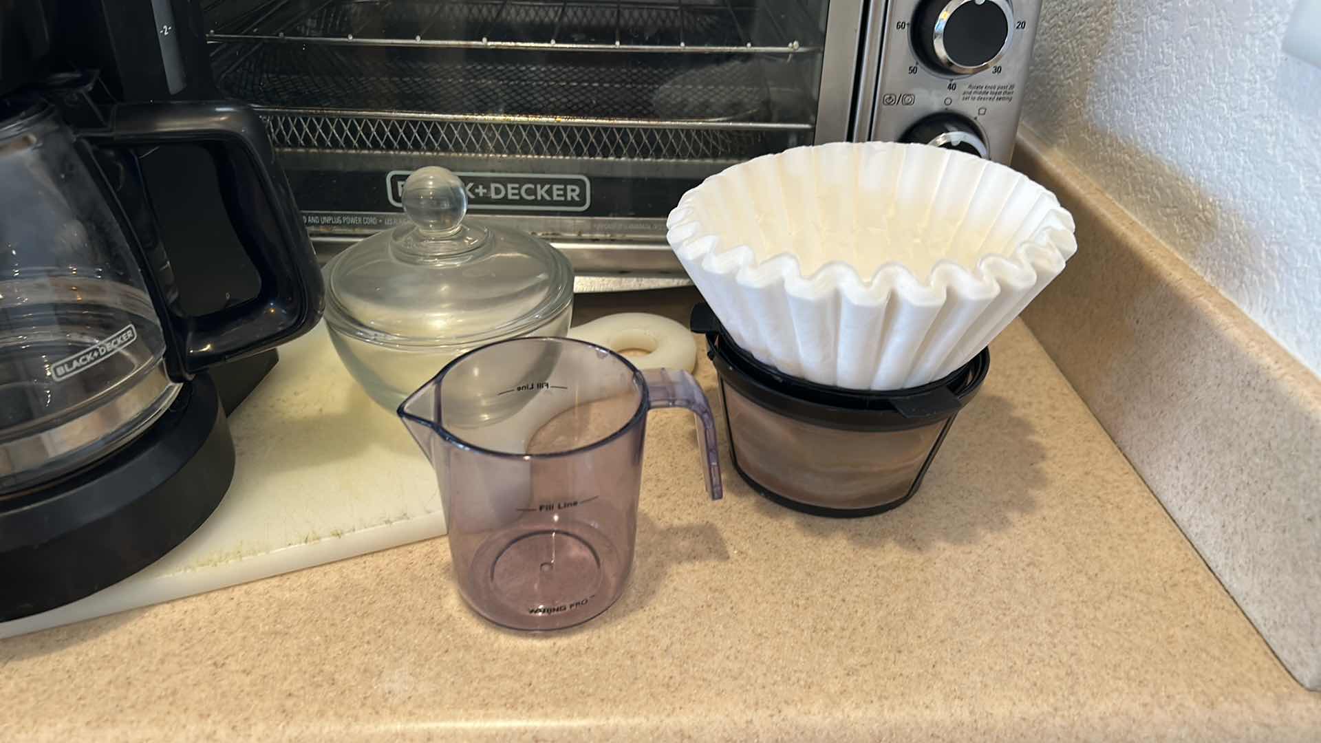 Photo 1 of KITCHEN APPLIANCES - BLACK AND DECKER TOASTER OVEN, COFFEE MAKER AND ACCESSORIES