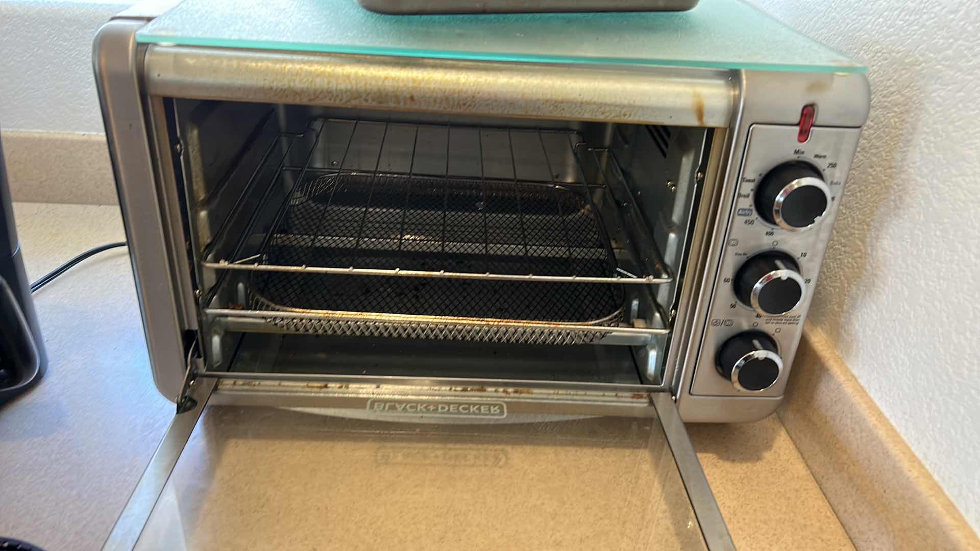 Photo 1 of KITCHEN APPLIANCES - BLACK AND DECKER TOASTER OVEN, COFFEE MAKER AND ACCESSORIES