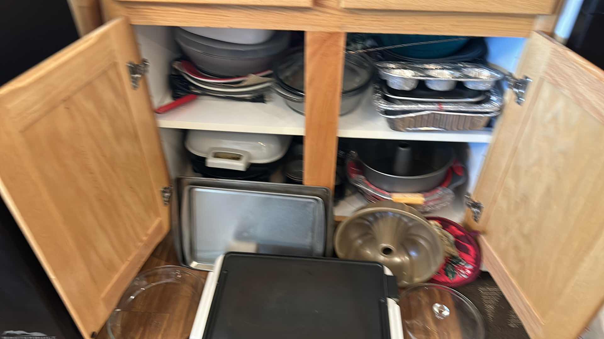 Photo 1 of CONTENTS OF KITCHEN CABINET- GRIDDLE, DEEP FRYER AND BAKEWARE
