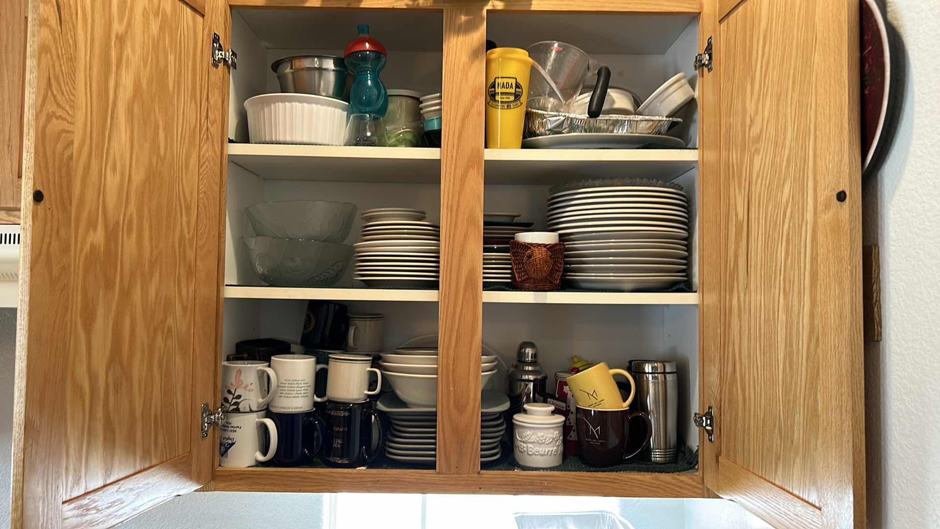 Photo 1 of CONTENTS OF KITCHEN CABINET- PLATES, COFFEE CUPS AND MORE