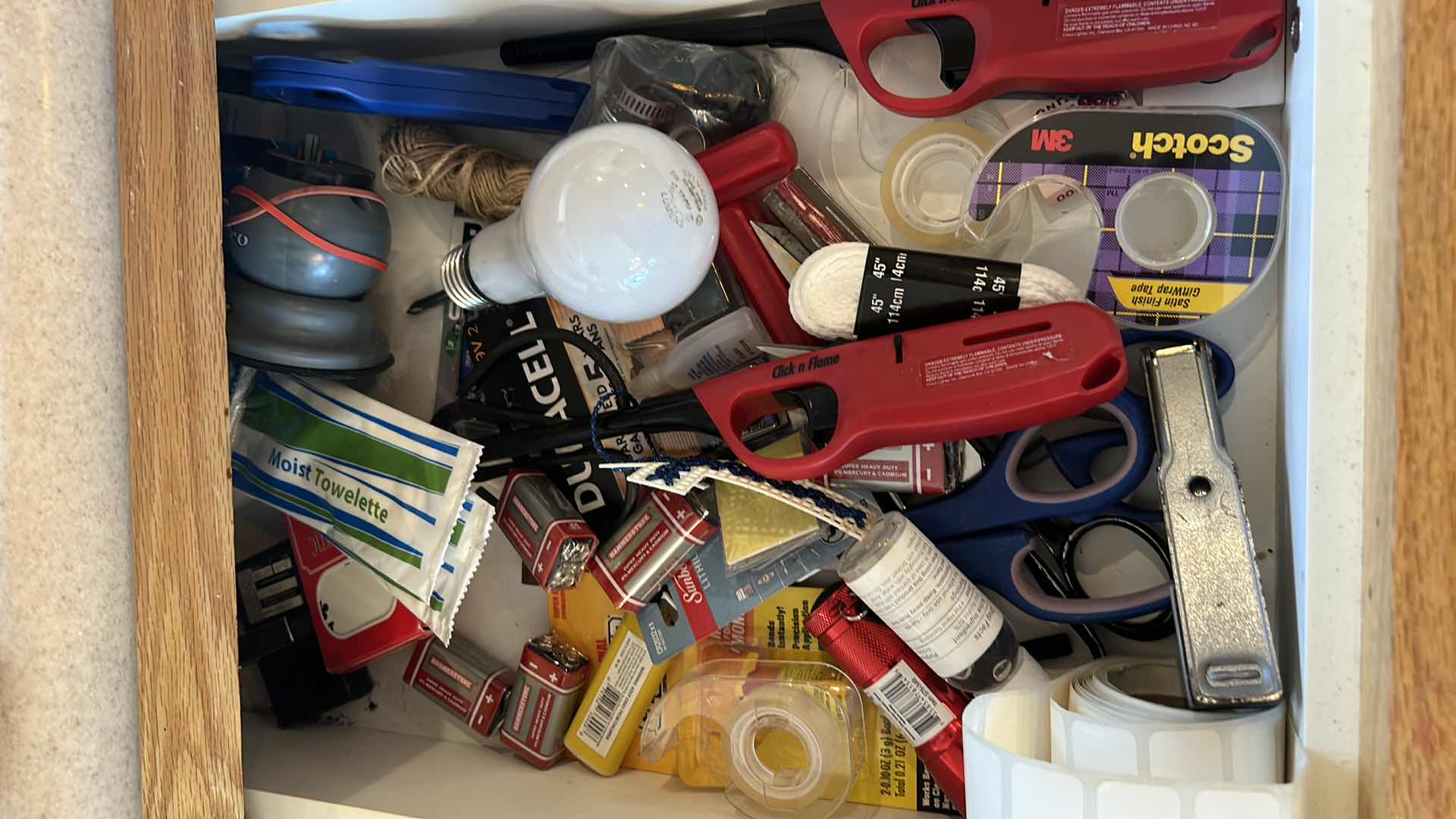 Photo 3 of 4 PHONES AND CONTENTS OF DRAWER