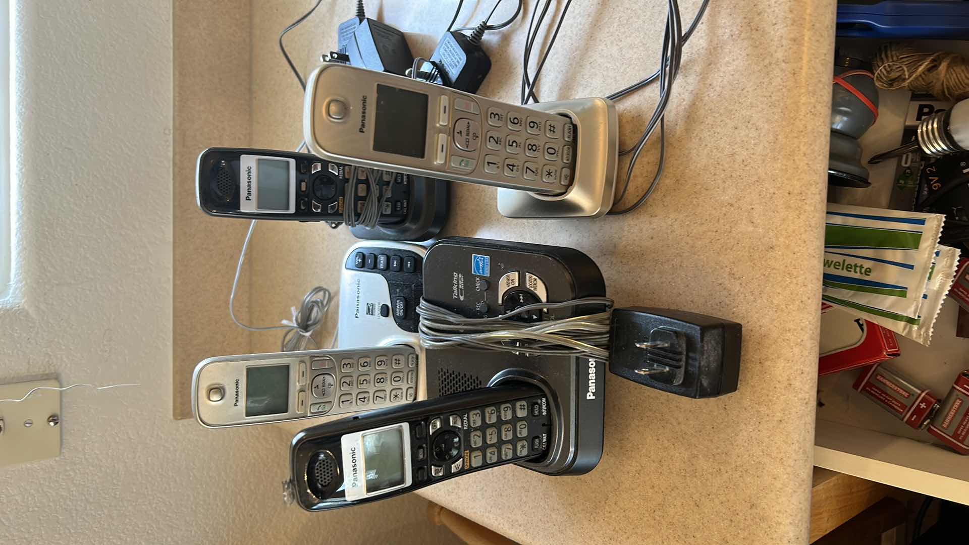 Photo 1 of 4 PHONES AND CONTENTS OF DRAWER