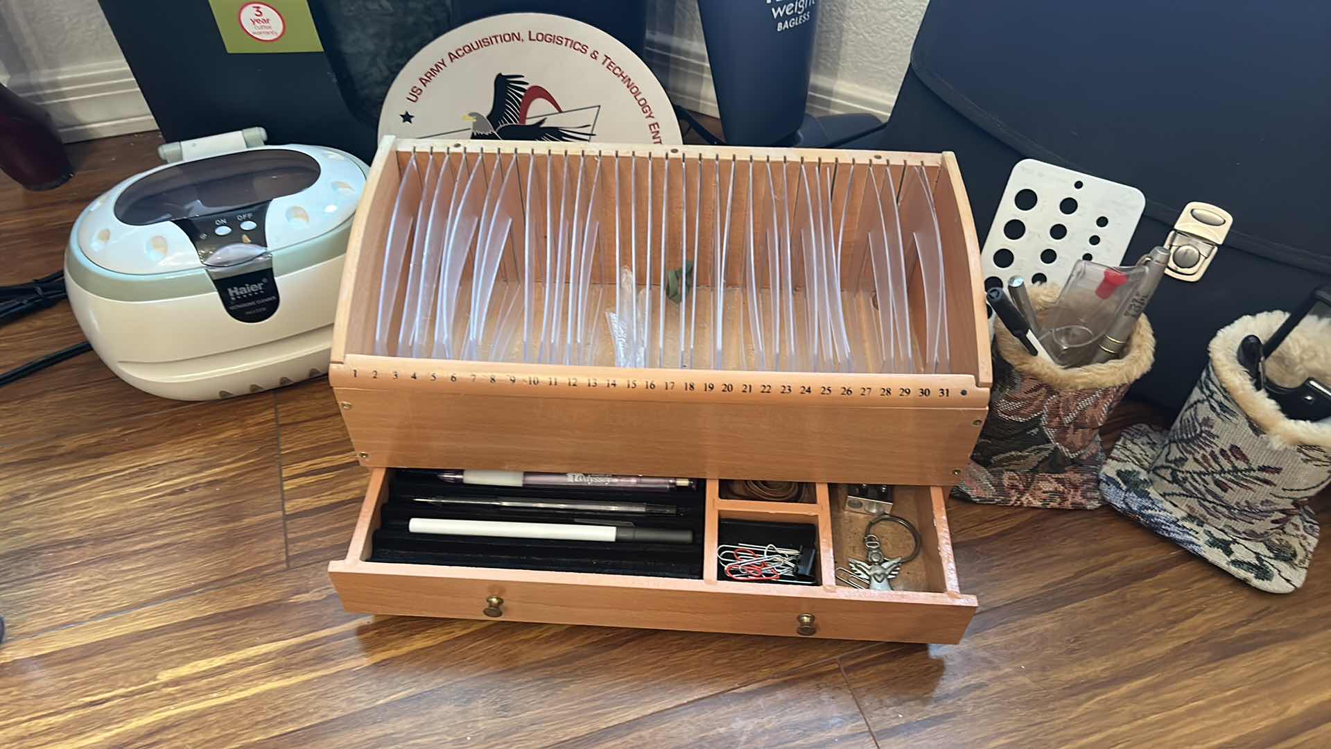 Photo 1 of OFFICE SUPPLIES- BISSELL FEATHER WEIGHT VACCUM L, CROSSCUT SHREDDER, HAIER ULTRASONIC CLEANER AND MORE