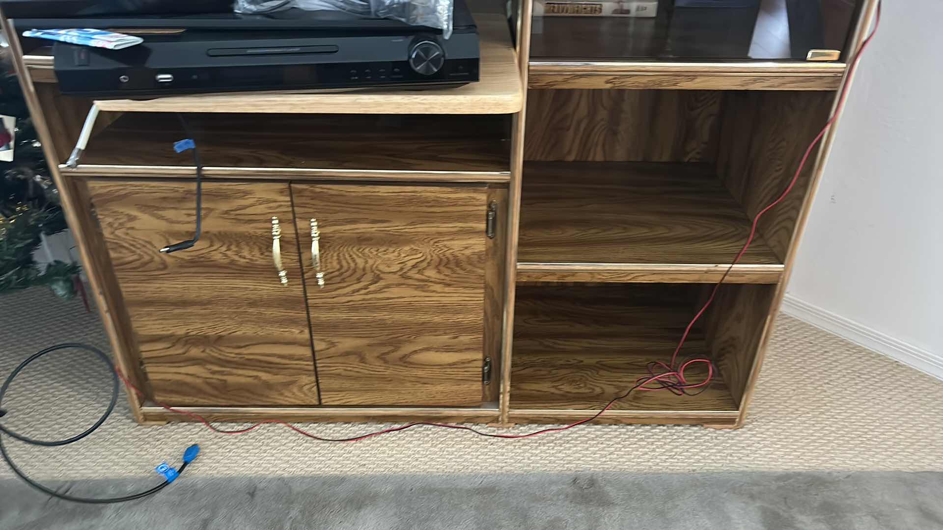 Photo 1 of WOOD ENTERTAINMENT CENTER WITH SMOKED GLASS POP OUT DOORS AND GOLD ACCENT 44“ x 17“ x 57” (CONTENTS SOLD SEPARATELY)