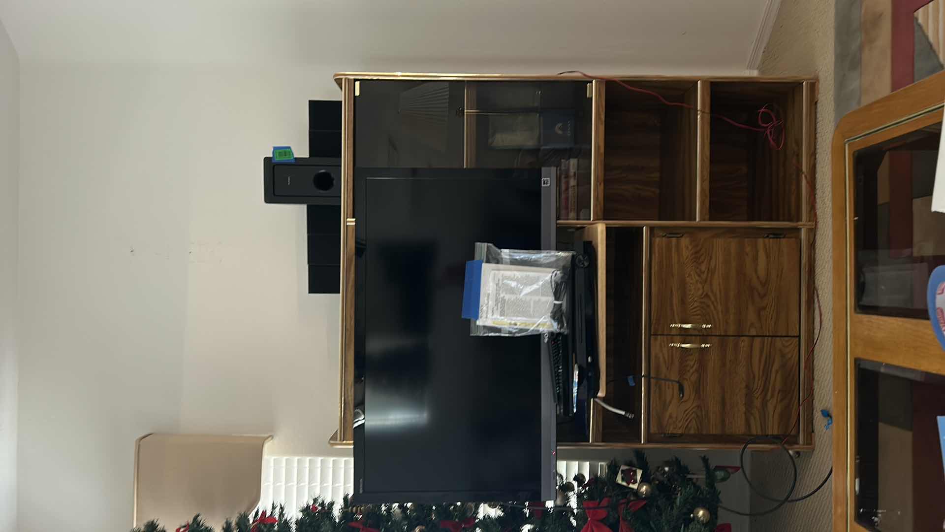 Photo 1 of WOOD ENTERTAINMENT CENTER WITH SMOKED GLASS POP OUT DOORS AND GOLD ACCENT 44“ x 17“ x 57” (CONTENTS SOLD SEPARATELY)