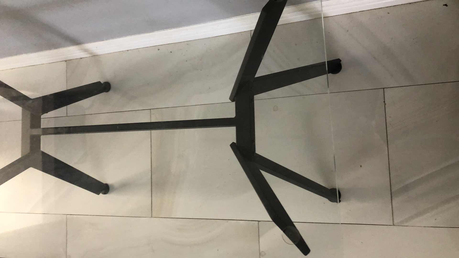 Photo 1 of GLASS TOP TABLE 
49” X 28” H 31”